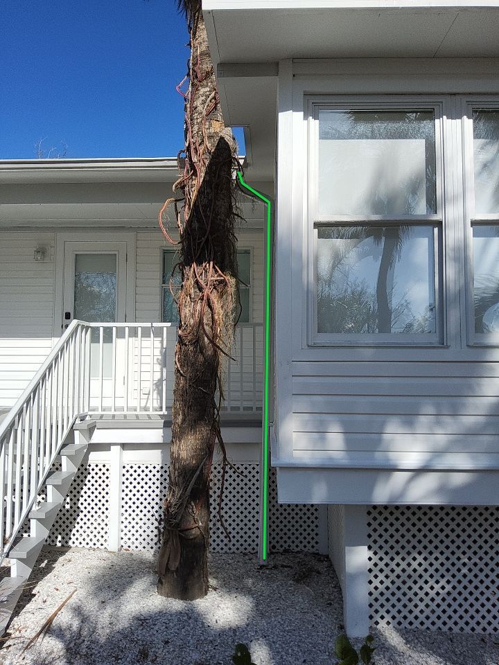 Downspout Installation using Charcoal Grey in Sanibel FL by Gutter Professors
