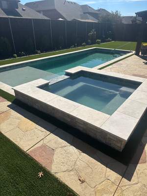 Geometric Pool with Raised Stone Spa