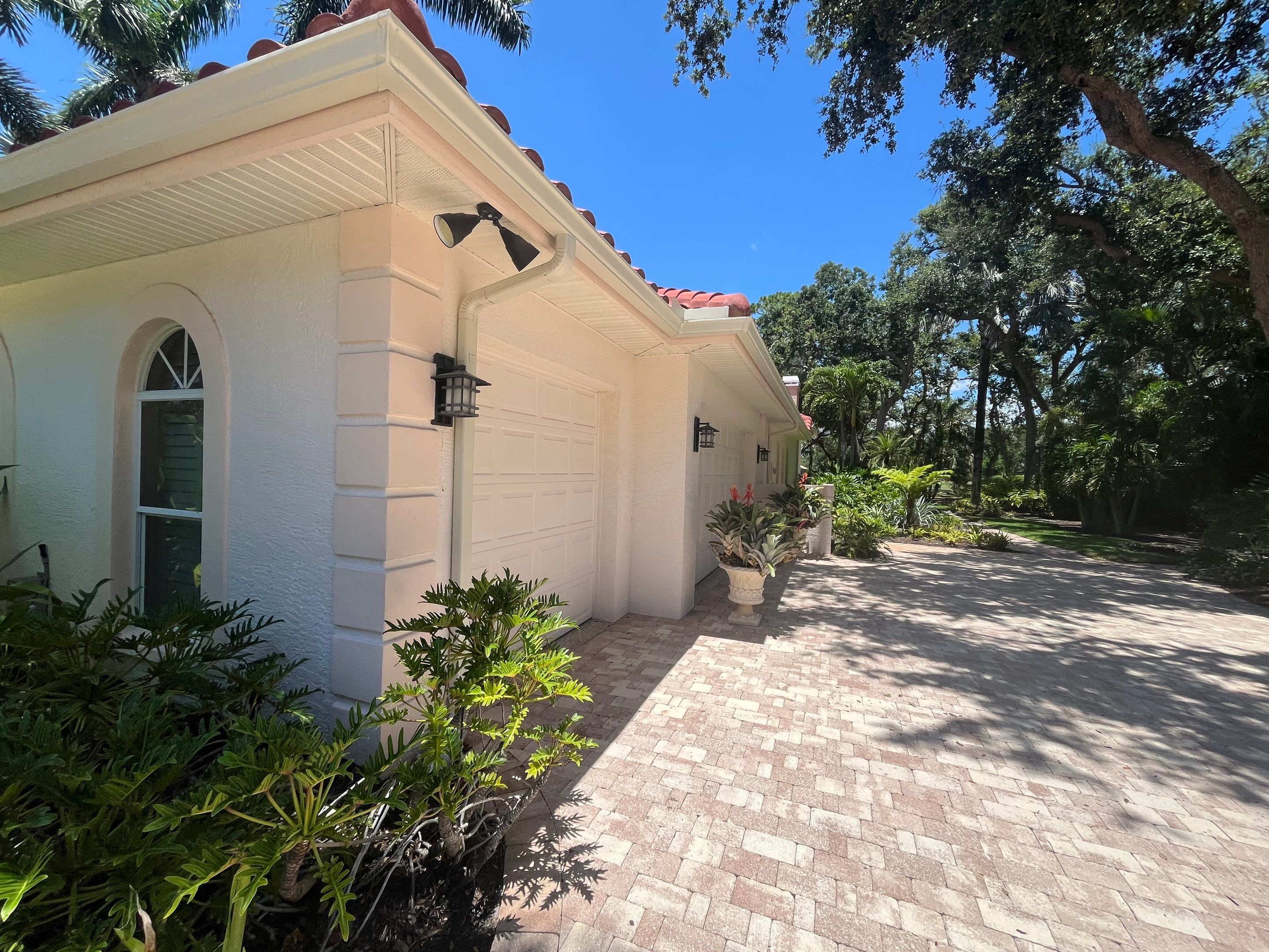 Splash Guard Gutters for Rainy Season Protection in Osprey FL by Gutter Professors