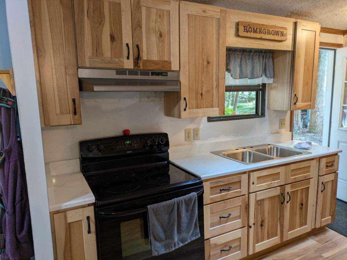 Stunning Kitchen Transformation with Raw Hickory Cabinets by A Step Above Handy LLC 