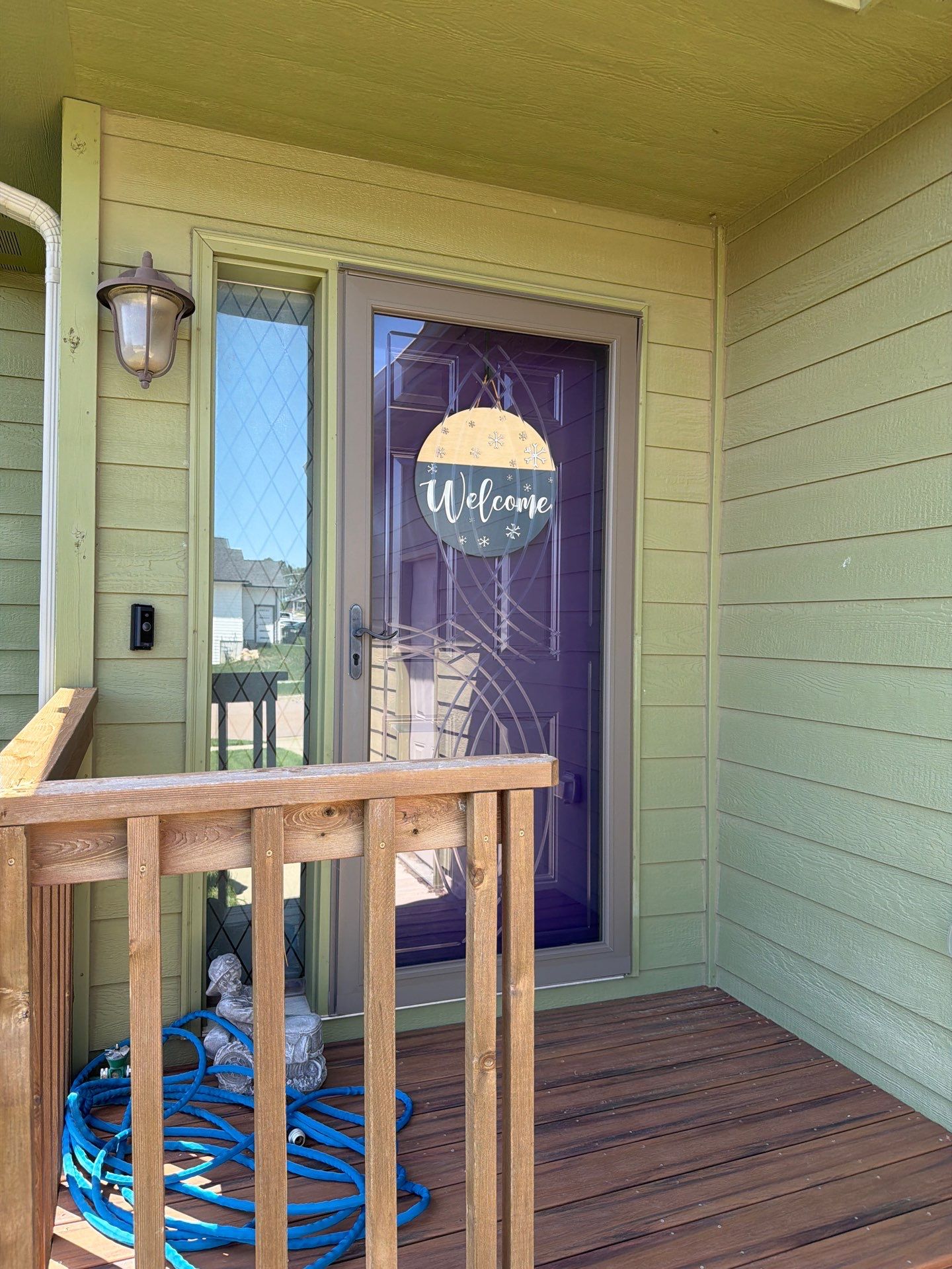 Exterior Painting and Custom Deck Construction in Sioux Falls by Select Painting, Coatings & Garage Cabinets