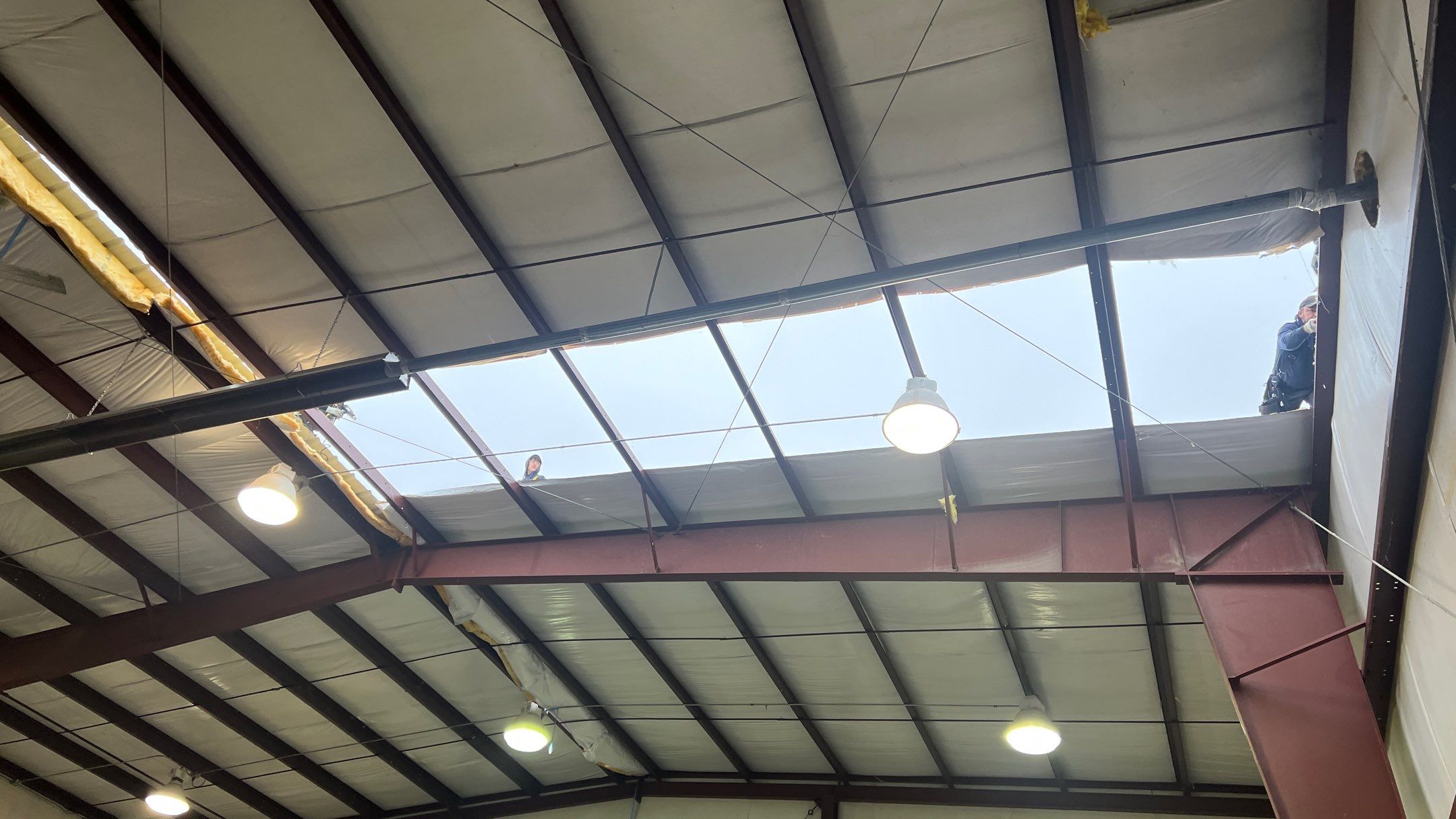 Airport Hanger Metal Roof Replacement and Insulation by Villegas Remodeling, LLC