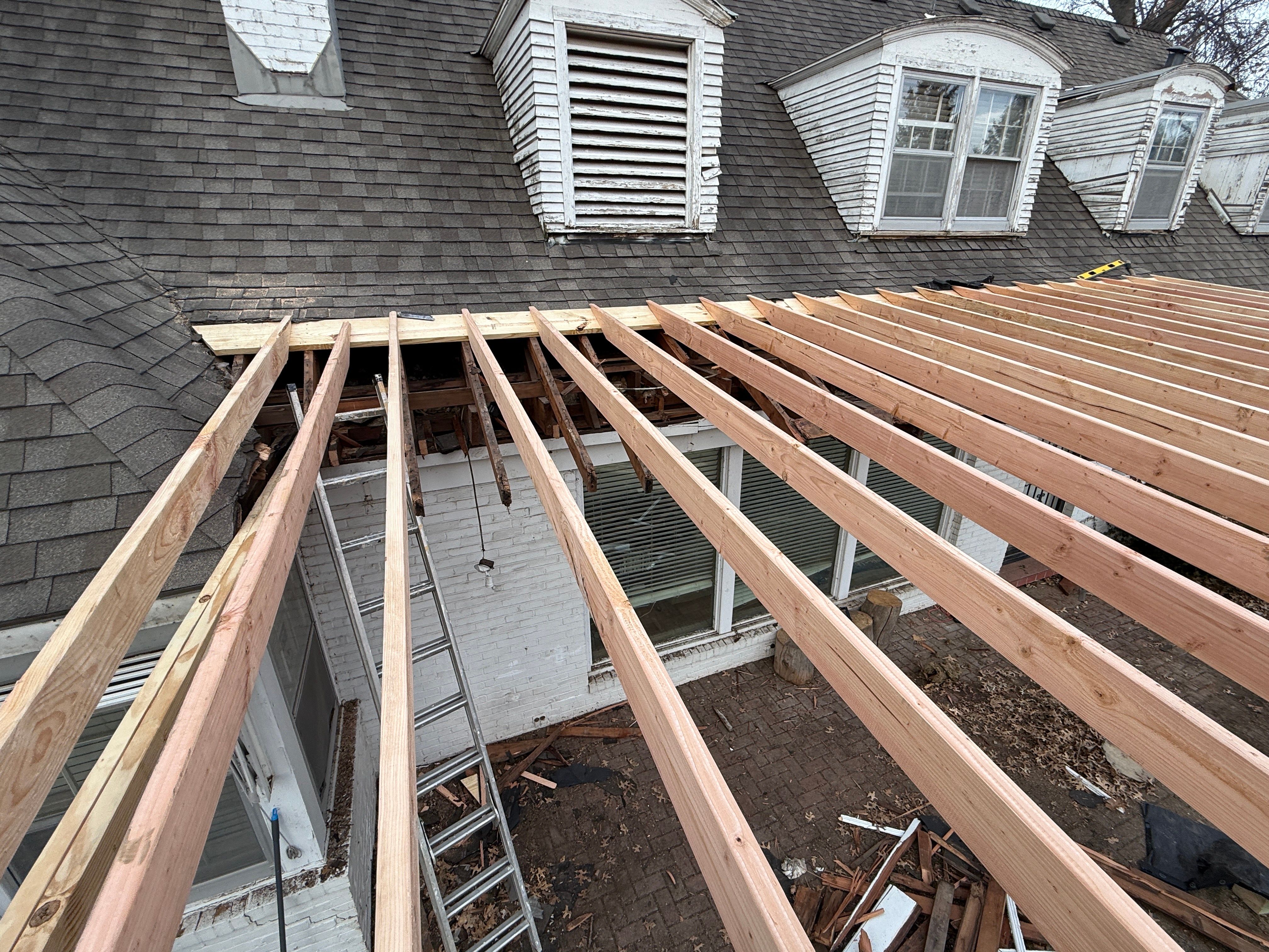 Roof Repair/Awning Rebuild from Tree Damage by Summit Roofing