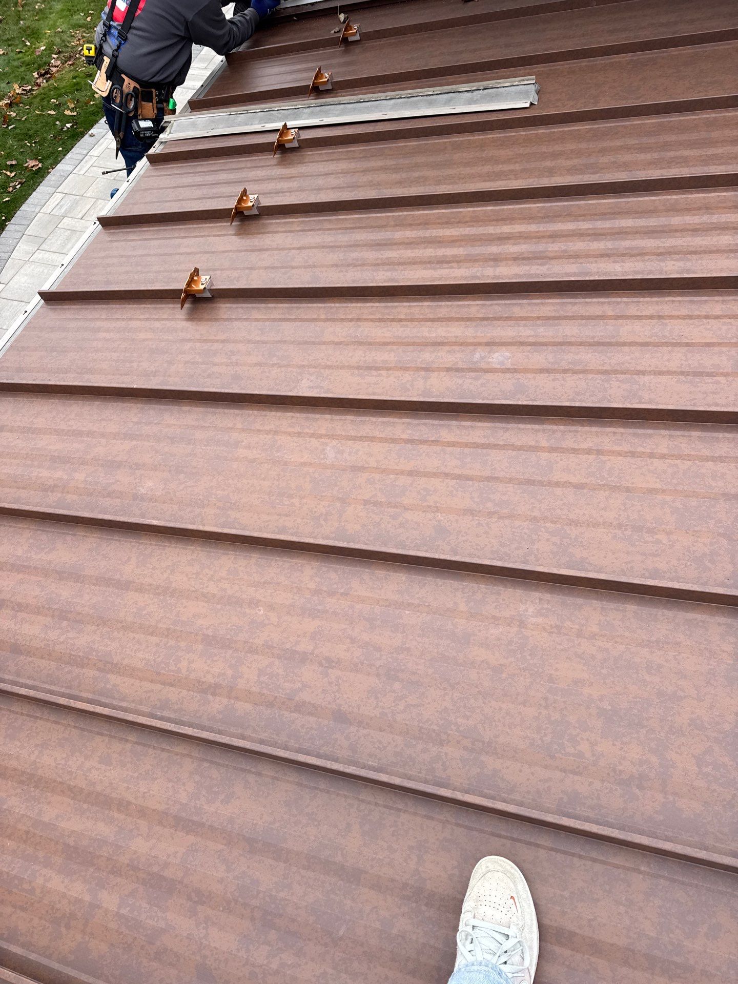 Roof Replacement using MS Standing Seam Roof Western Rust by 180 Contractors