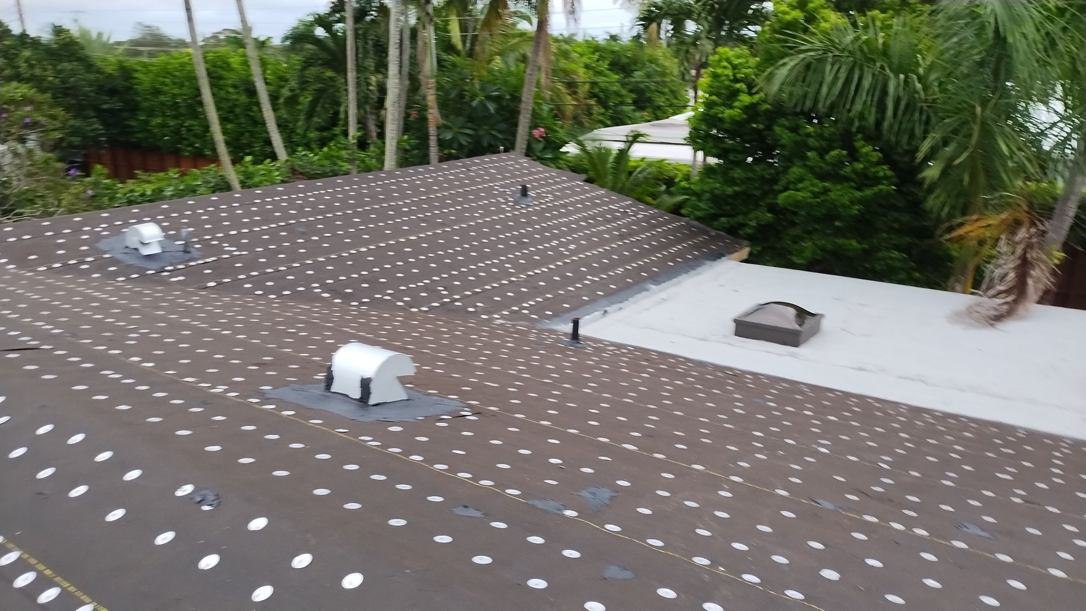 Residential Roofing Installation using 1" Nail strip metal roof by BLUES BROTHERS ROOFING