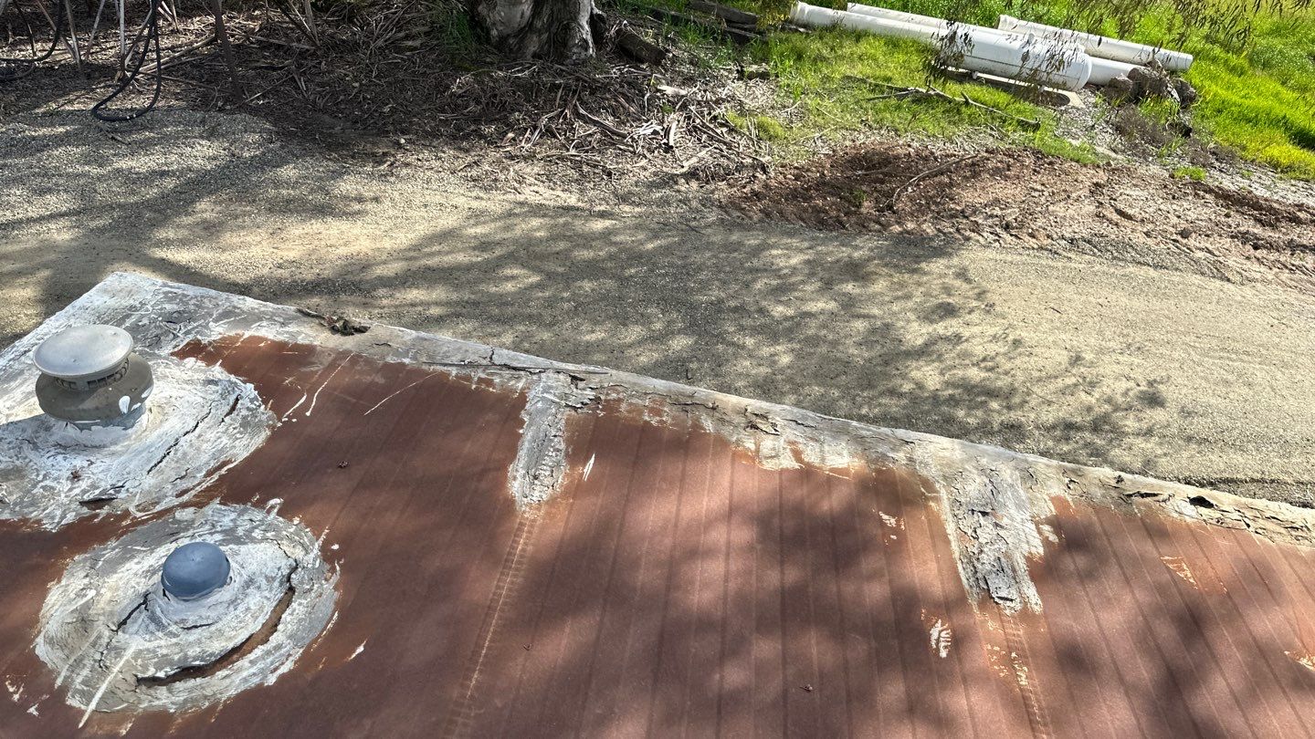 Foam and coatings on mobile home by Straight Edge Roofing Inc