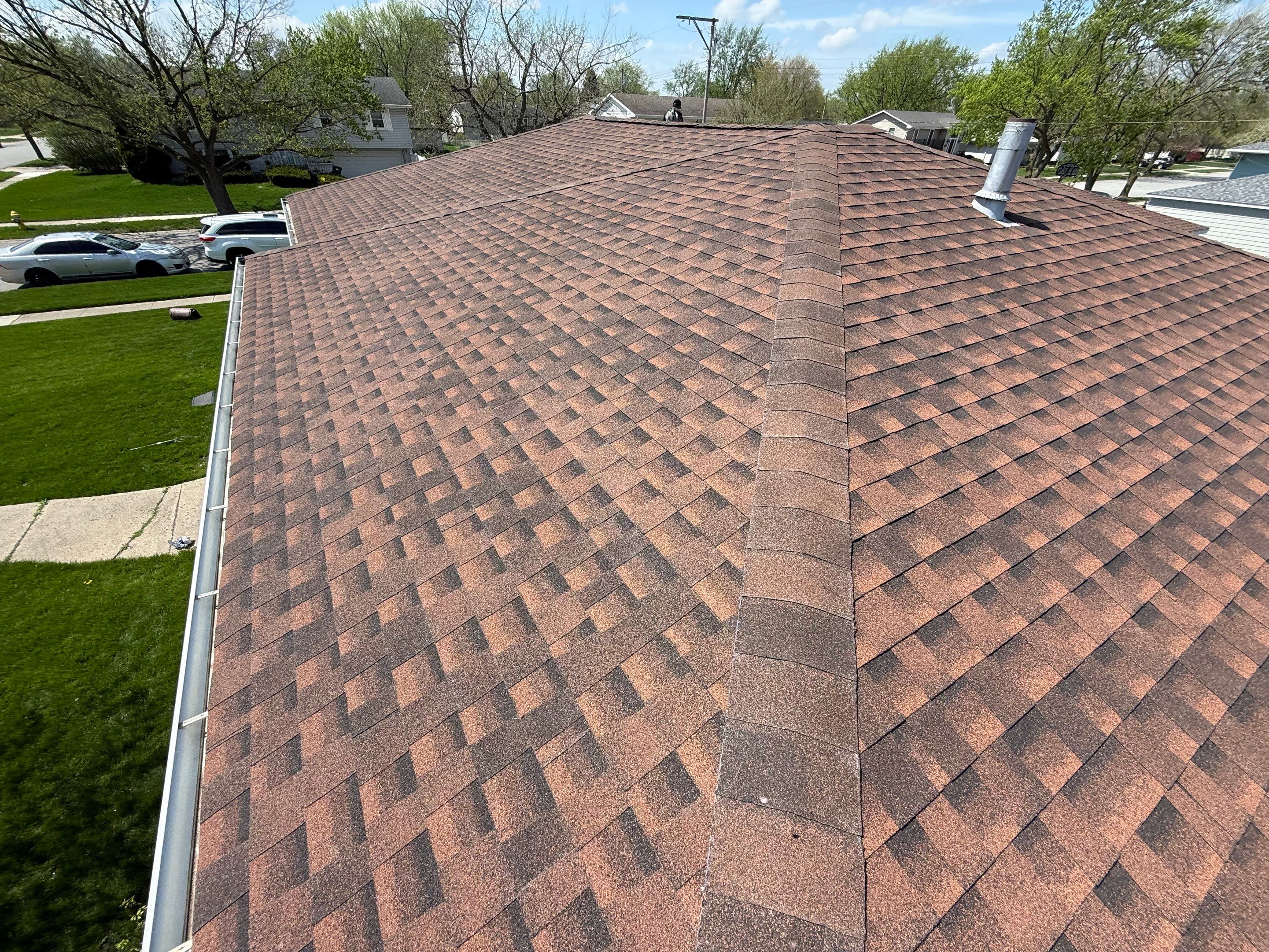 House and garage roof replacement by Optimal Home Improvement 