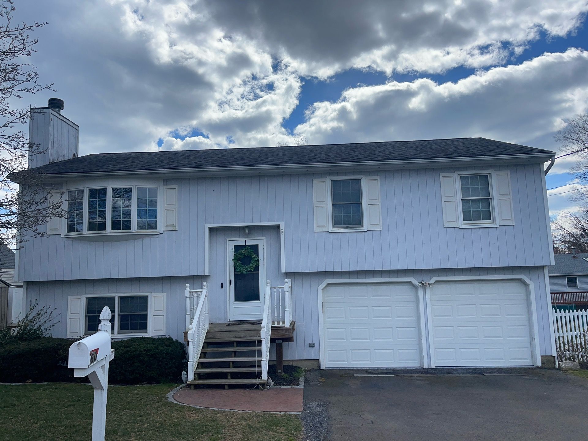 Siding Installation using Certainteed Cedar Impressions Straight Edge Perfection Shingles - D7 - Pacific Blue by A Plus Exterior