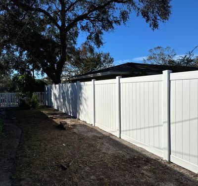 Vinyl Fence Installation using 6Ft White Vinyl Fence with a 4Ft White Picket Fence