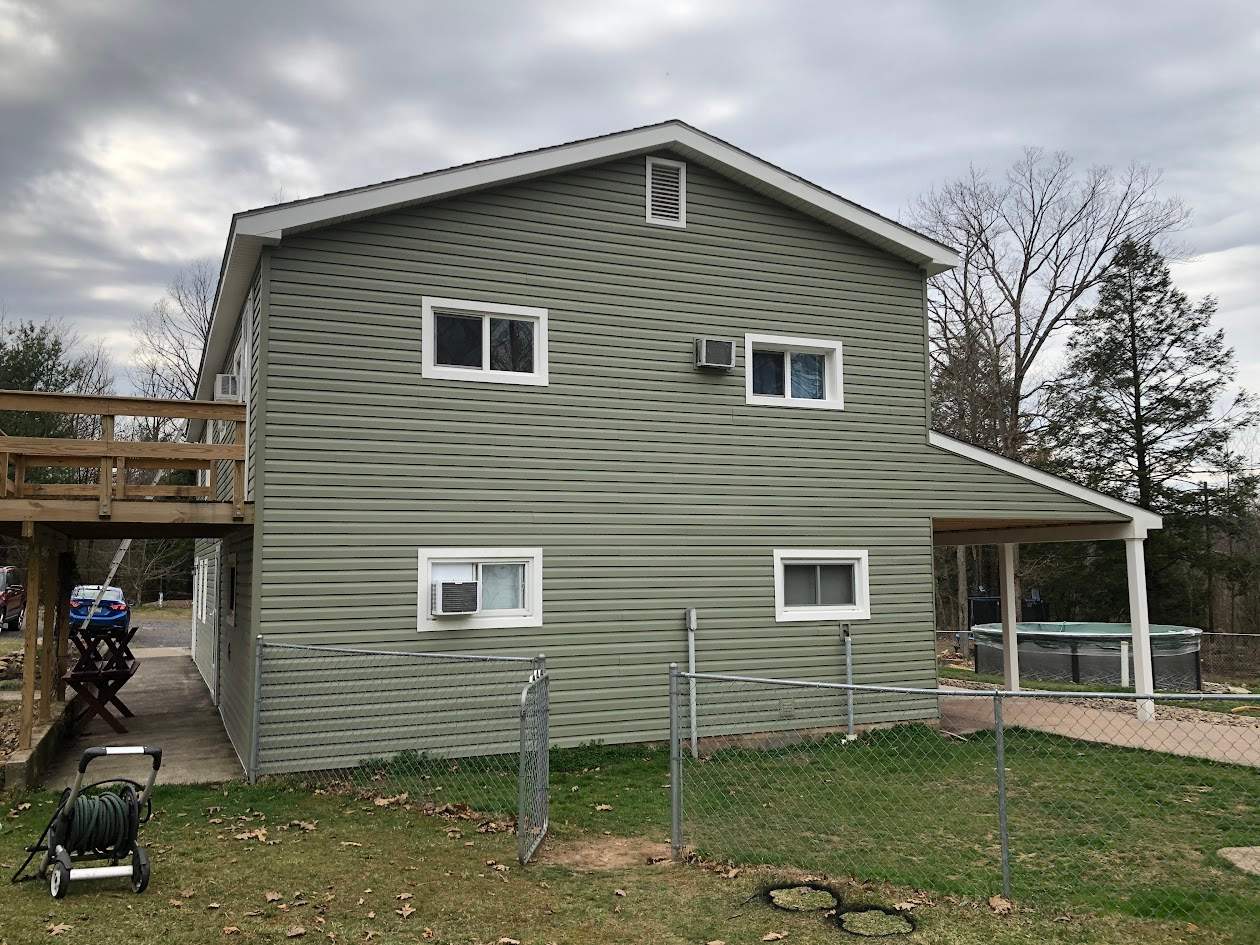 Sage Green Vinyl Siding and Exterior Trim Replacement in Ashland by Esh Builders