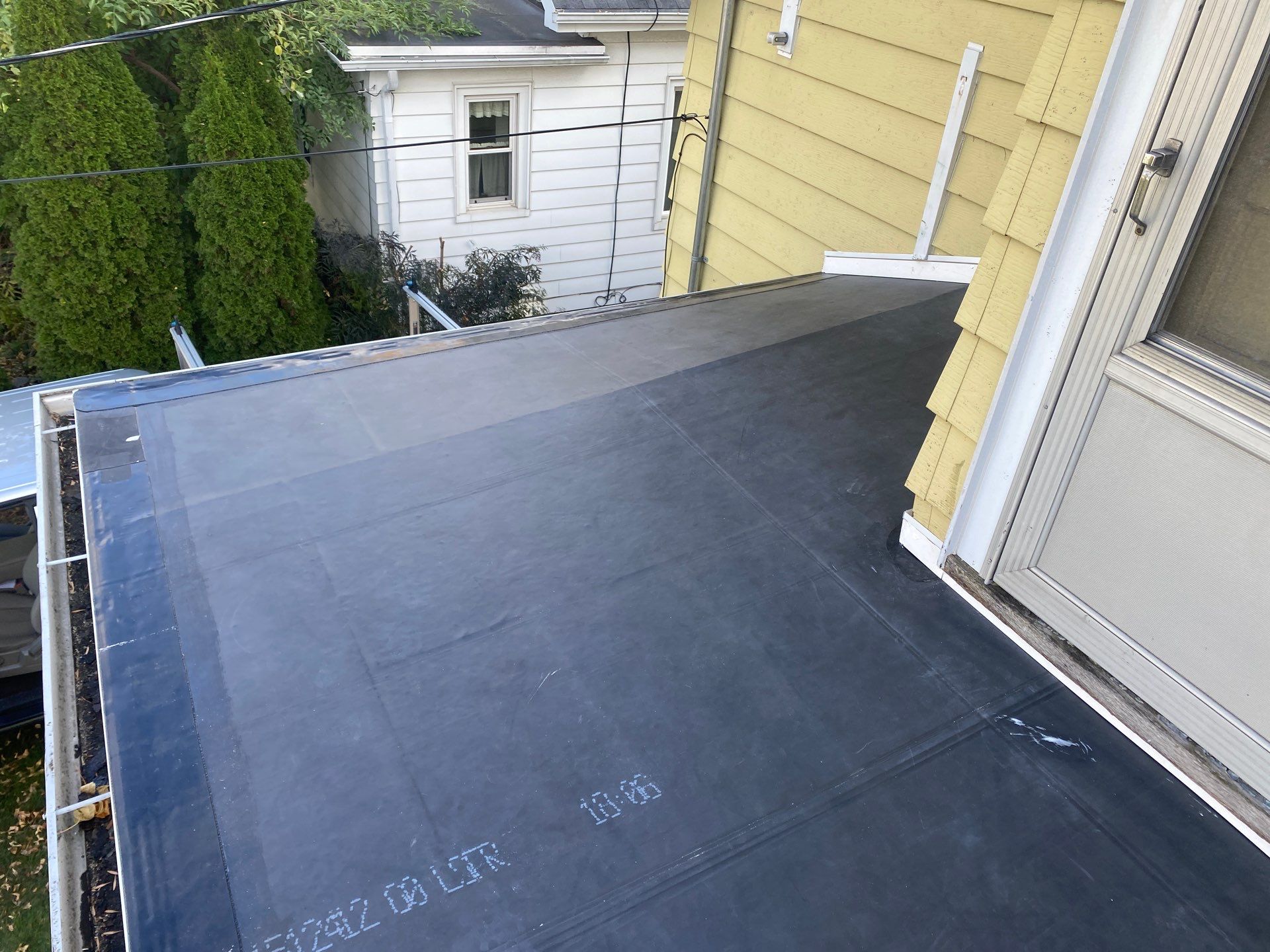 Flat Roof Porch with 60mil EPDM Rubber by Gellings Roofing & Siding