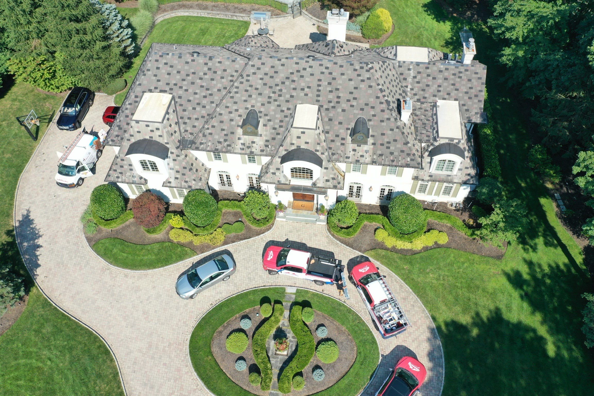 Full Slate - Stucco - Copper Remodel by USA Roof Masters