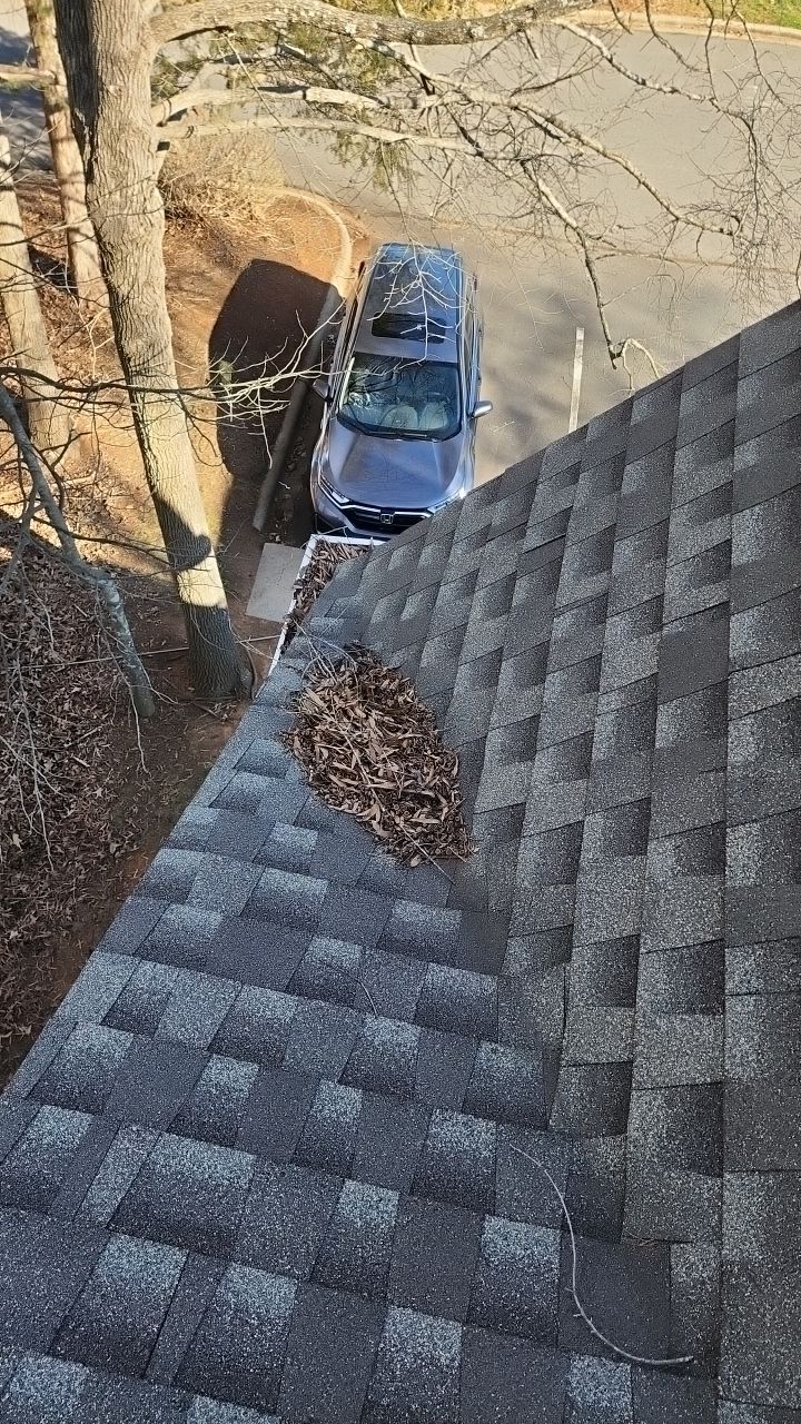 Gutter Cleaning using water by Power Wash Masters LLC