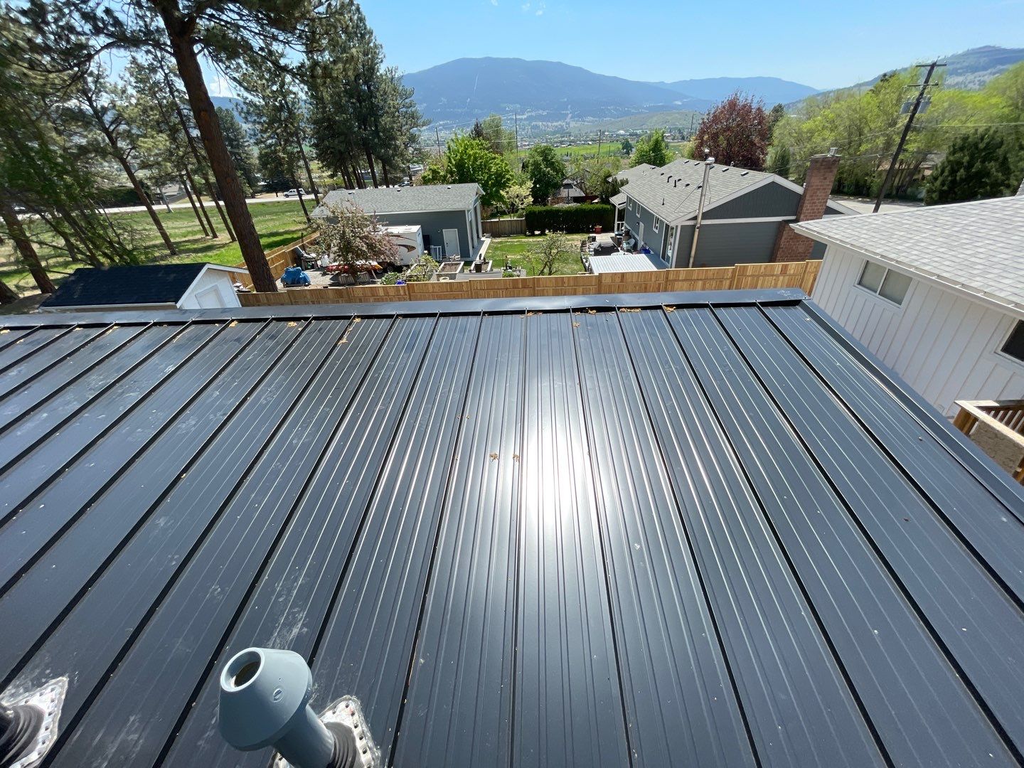 Residential Roofing Installation using 12" Prolok metal  by Top Notch Roofing Inc