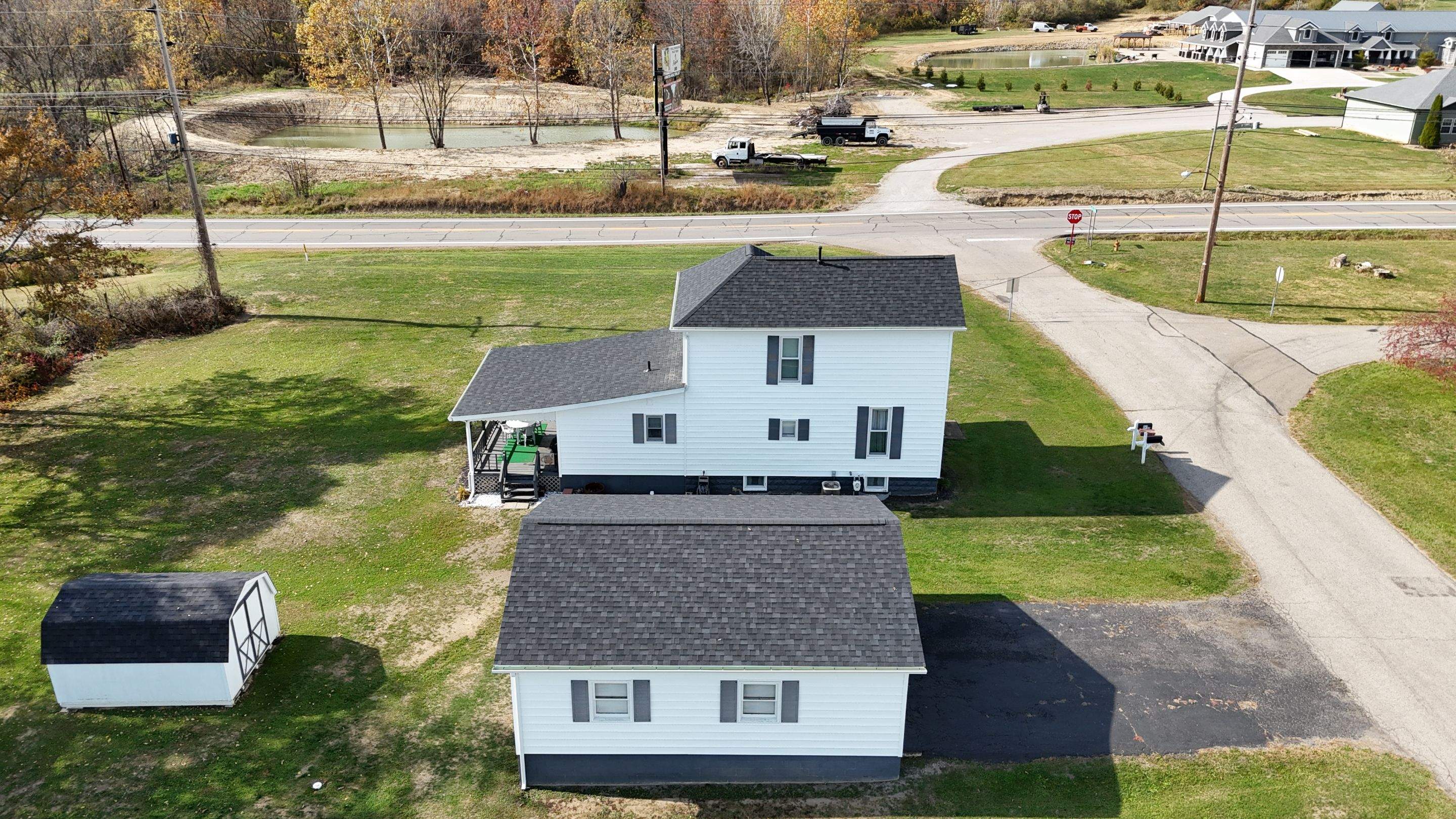 Roseville, Ohio Shingle Roof and Siding Installation by Pine Ridge Roofing LLC