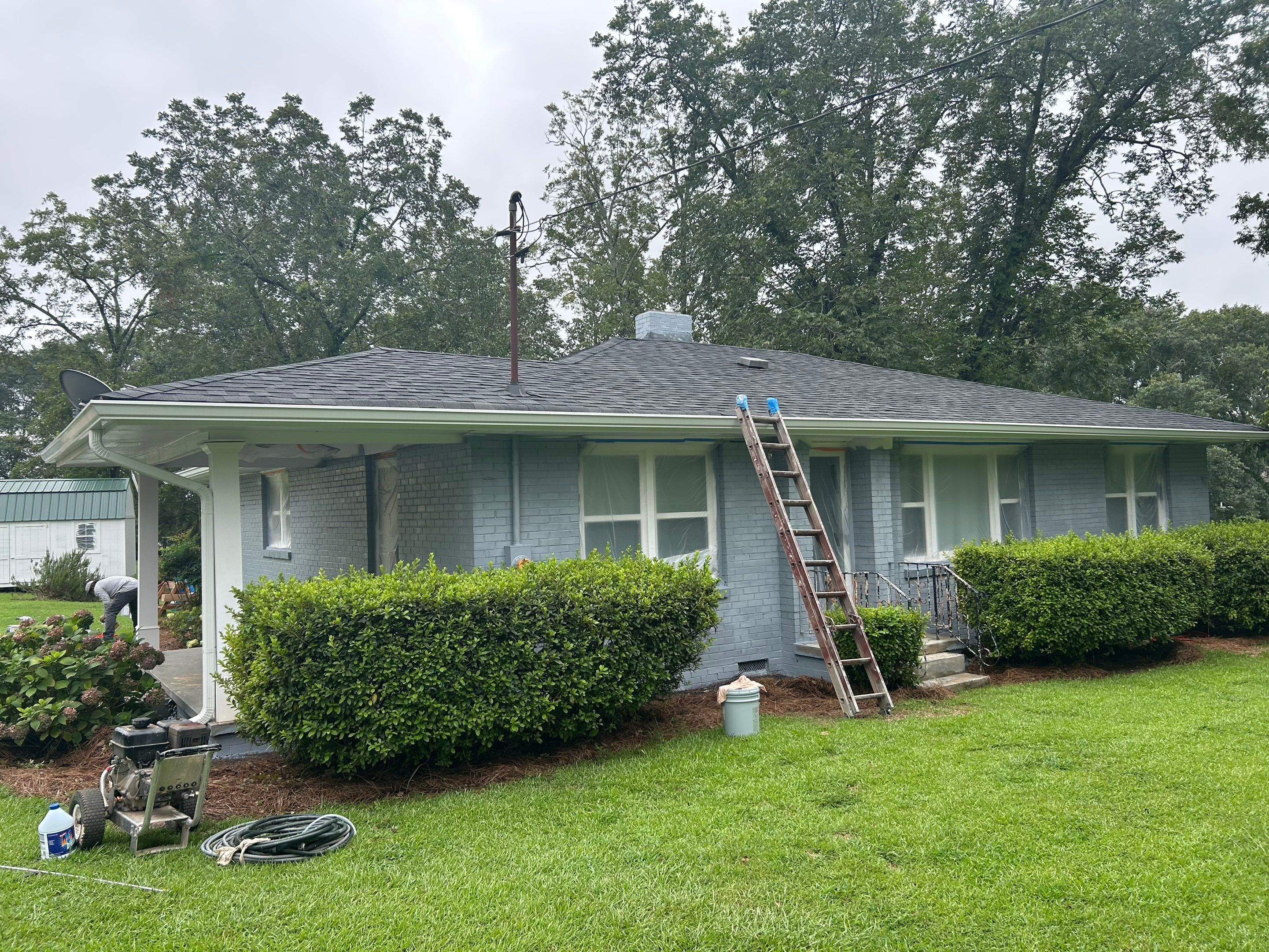 Social Circle Masonry Transformation with Dark Charcoal Exterior Painting by PGP Surface Solutions, LLC