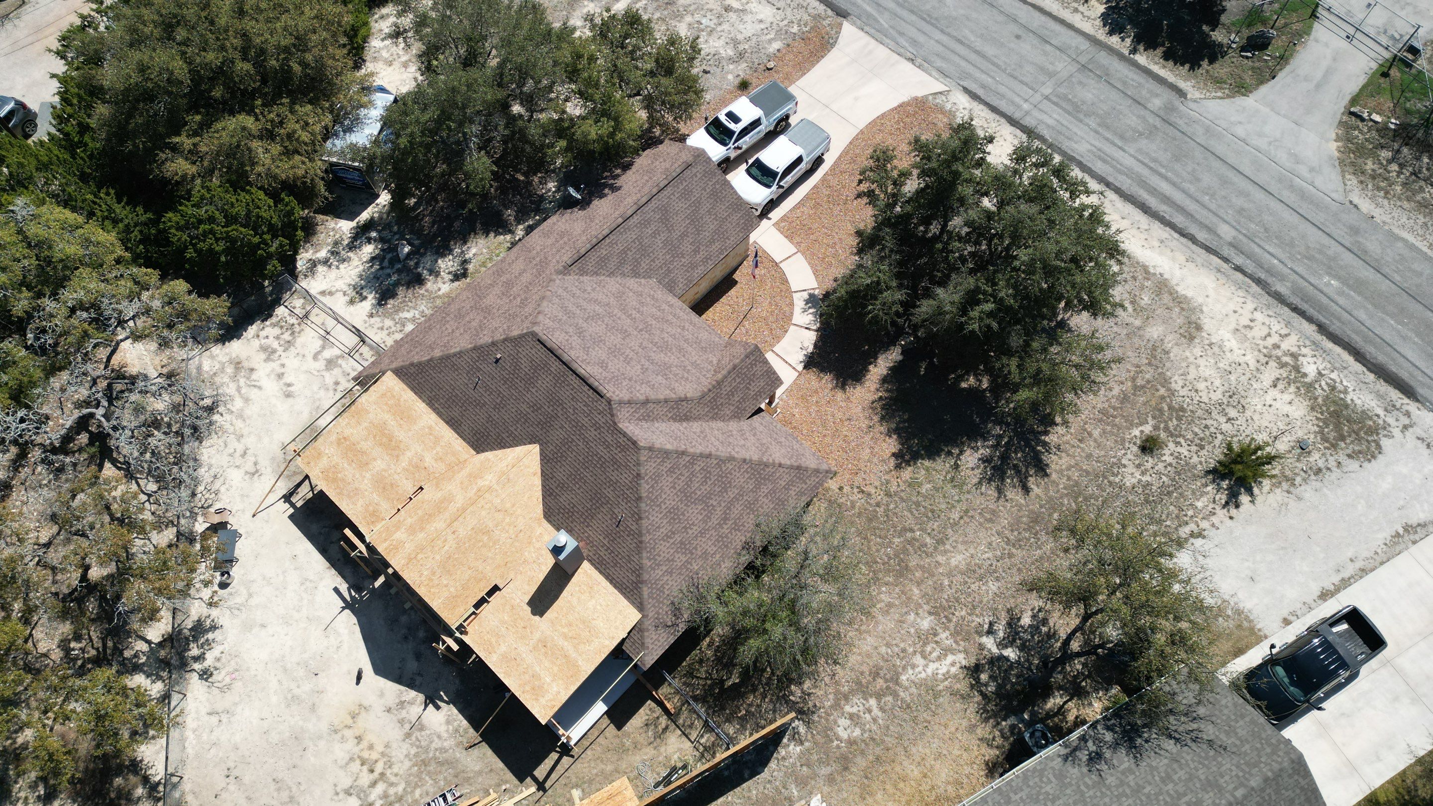 Reroof with Back Patio Addition using Owens Corning Duration Aged Copper by Lightning Exteriors