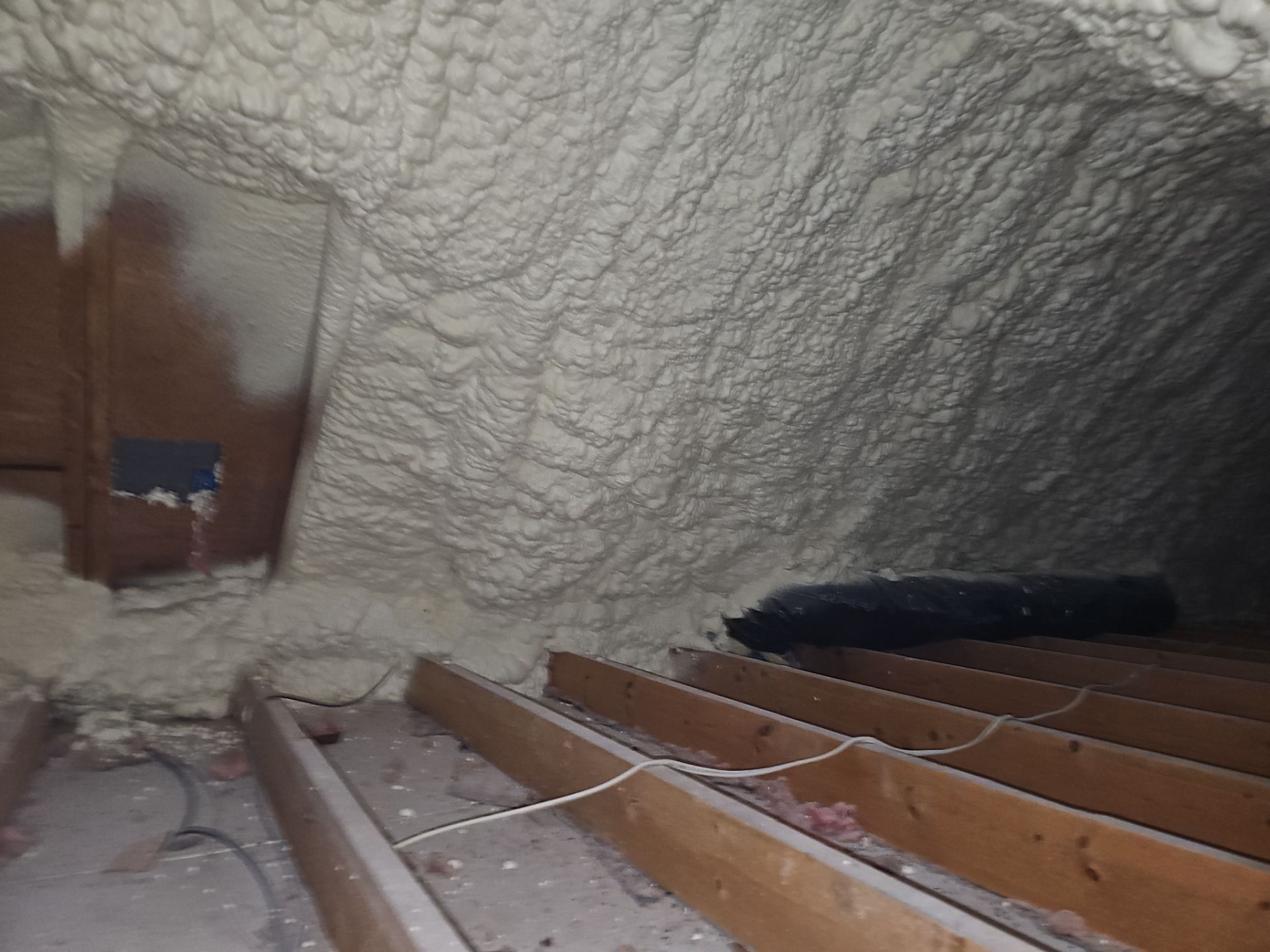 Attic Insulation using open cell spray foam by NYS Foam & Energy