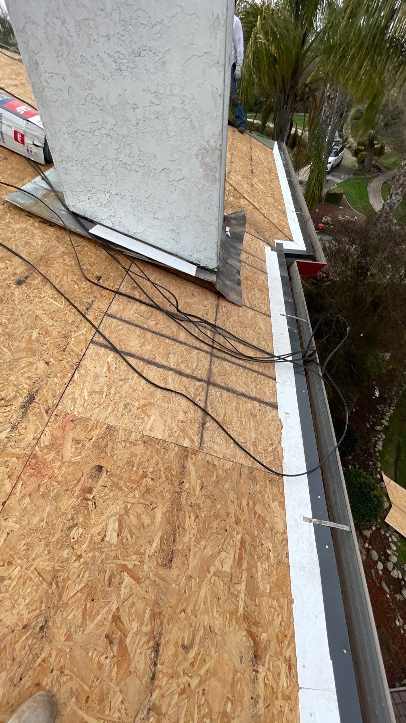 Tile refurbish project using existing tiles and replaced underlayment and battens by Straight Edge Roofing Inc