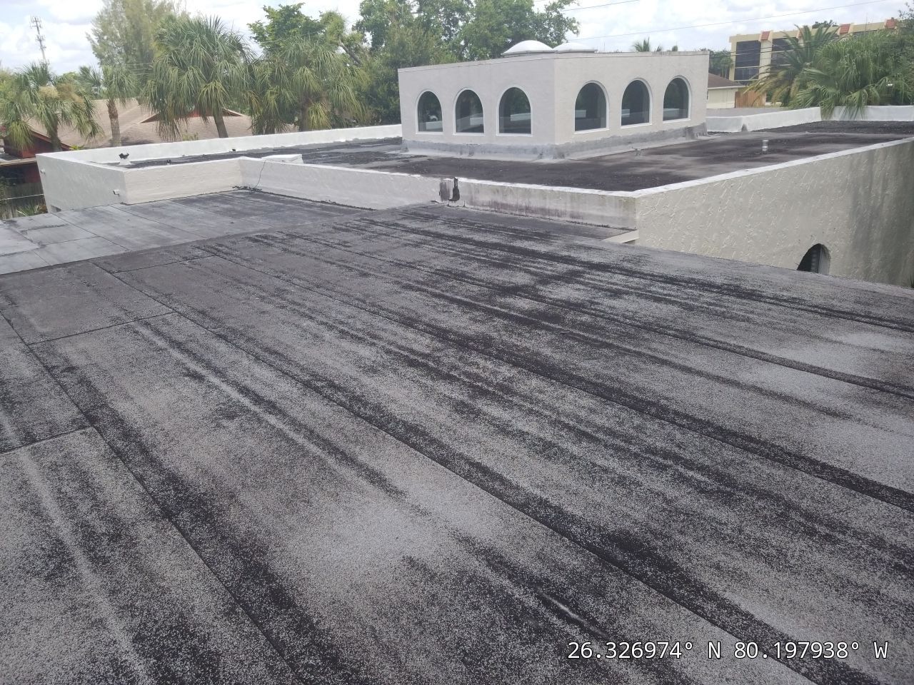 Flat Roof Restoration and Reflective Silicone Coating in Pompano Beach by Aastro Roofing