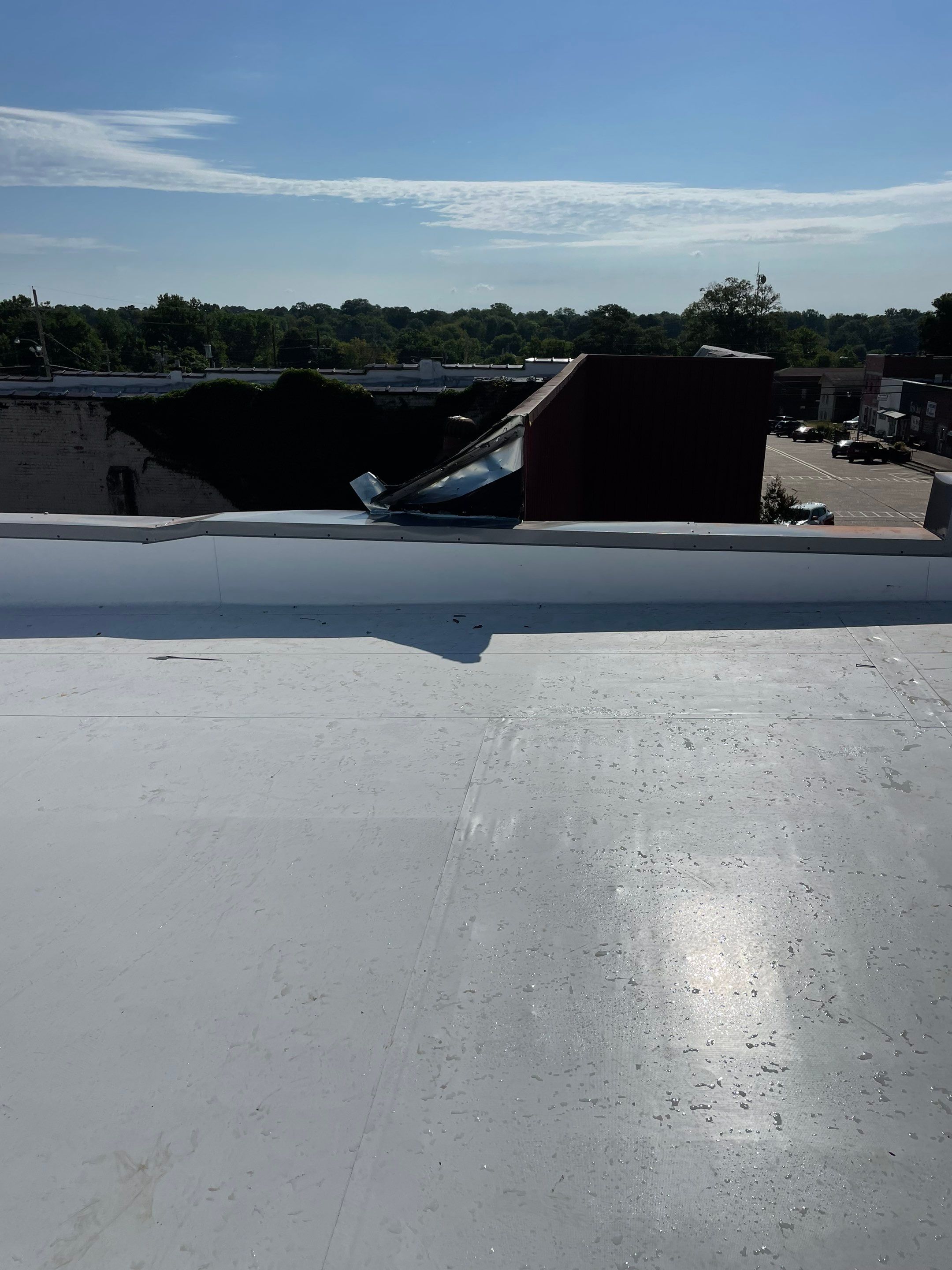 Commercial Roofing Installation in DeQueen, AR, using 50 mil PVC by Hostetler Roofing