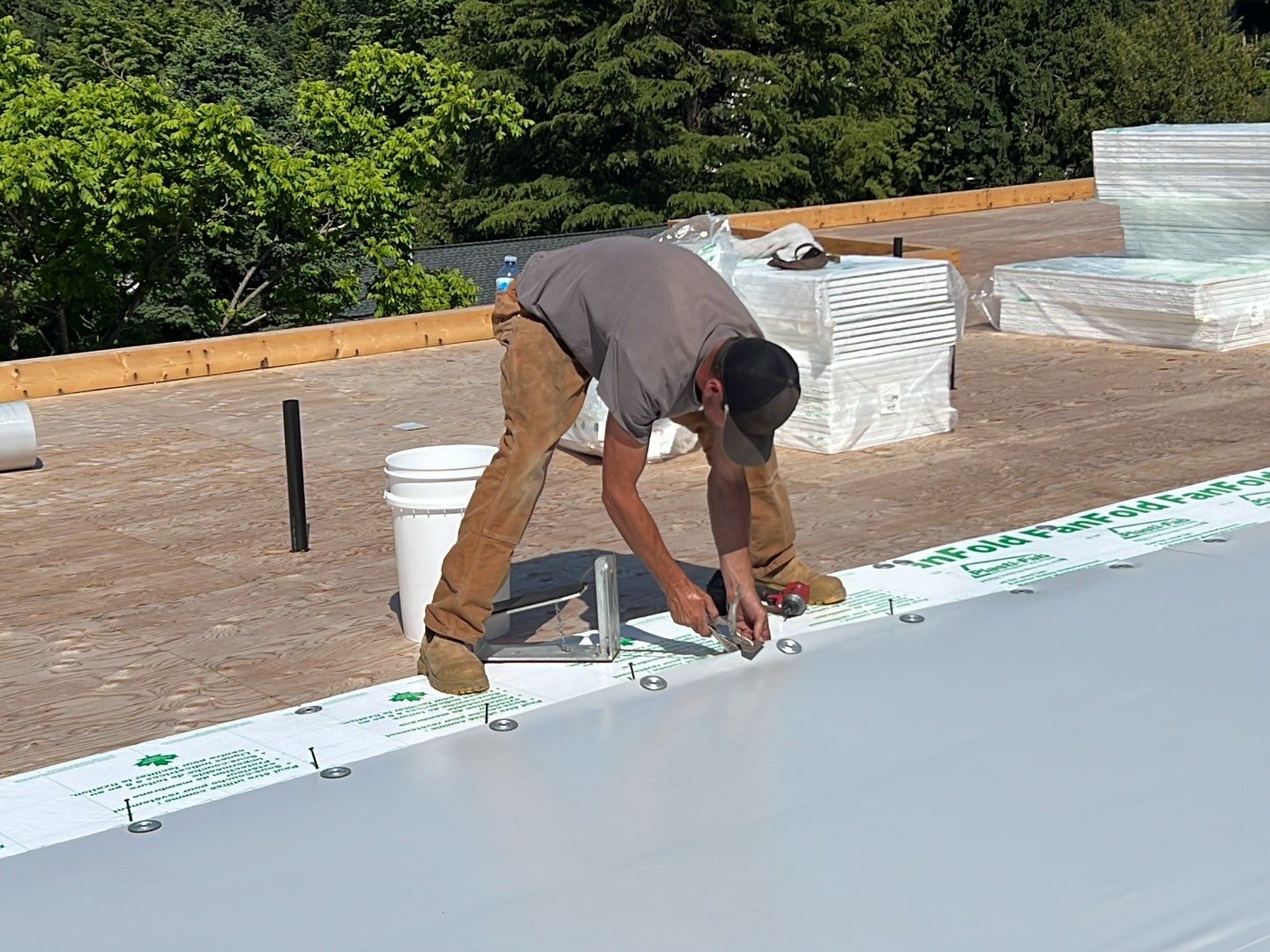 Residential Roofing Installation using Durolast roofing membrane by Top Notch Roofing Inc