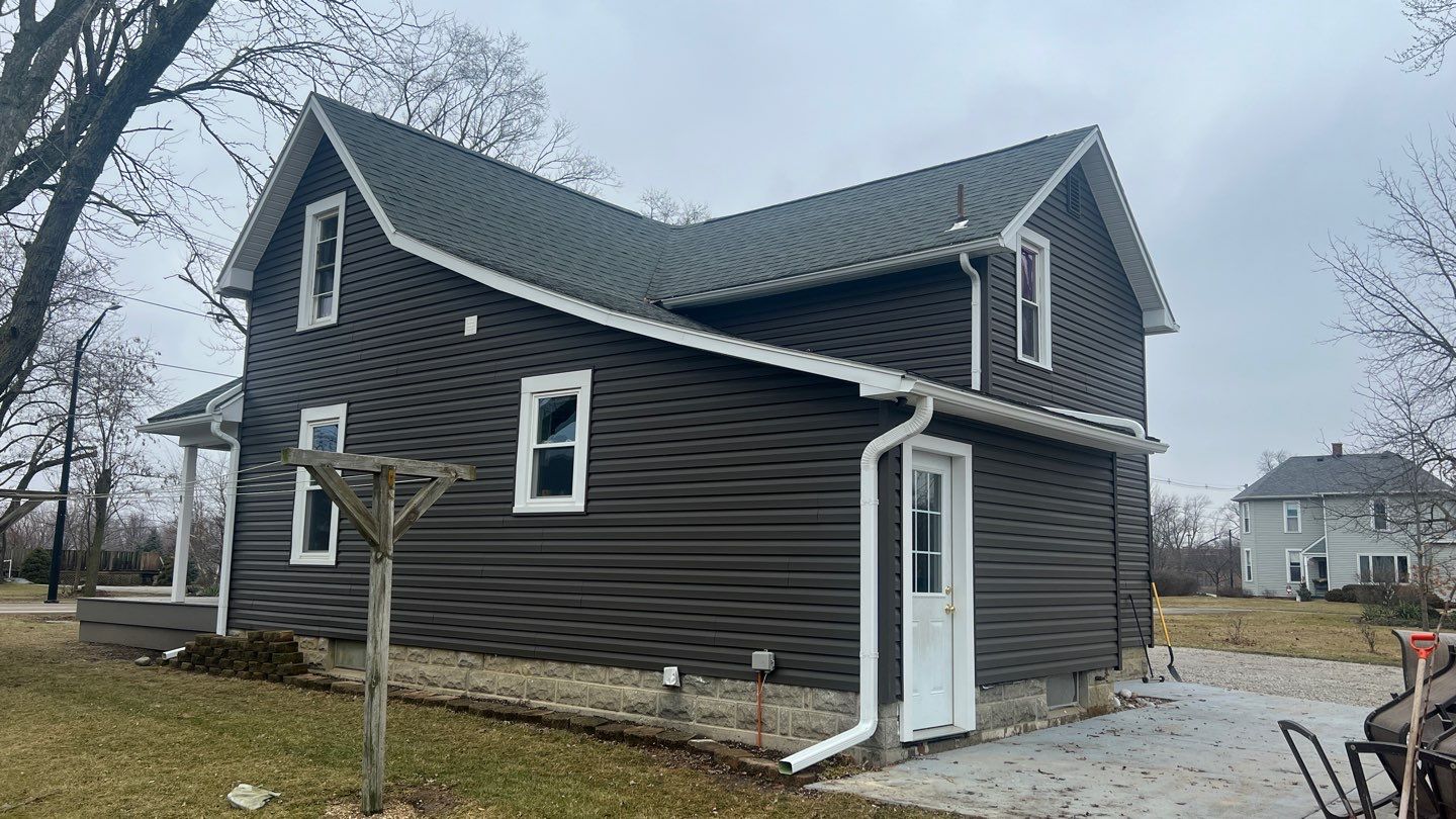 Residential fascia replacement using Exterior Portfolio 4.5 DL - Peppercorn by Nitro Roofing and Construction