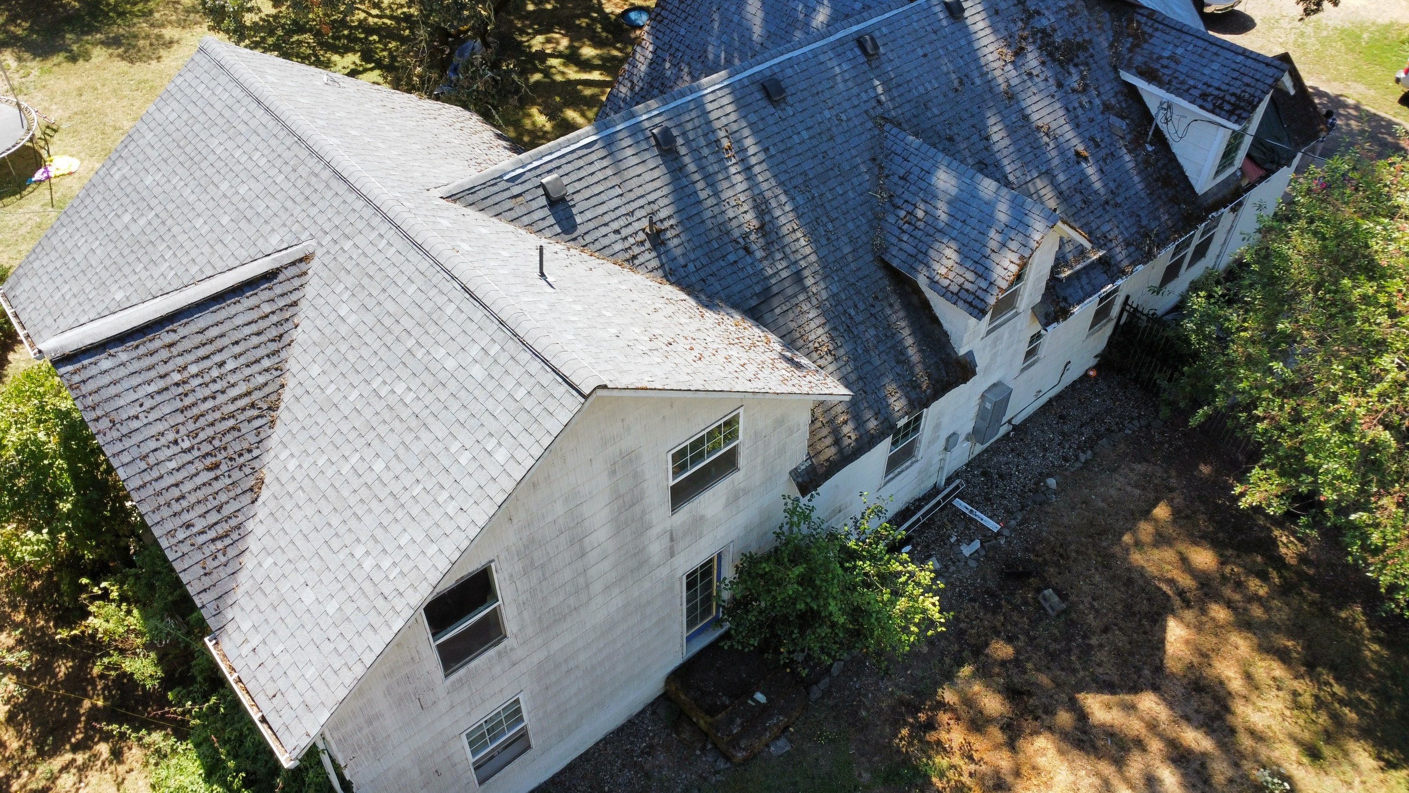 Residential Roofing Installation using IKO Dynasty (Color: Granite Black) by Orezona Building & Roofing Company, Inc.