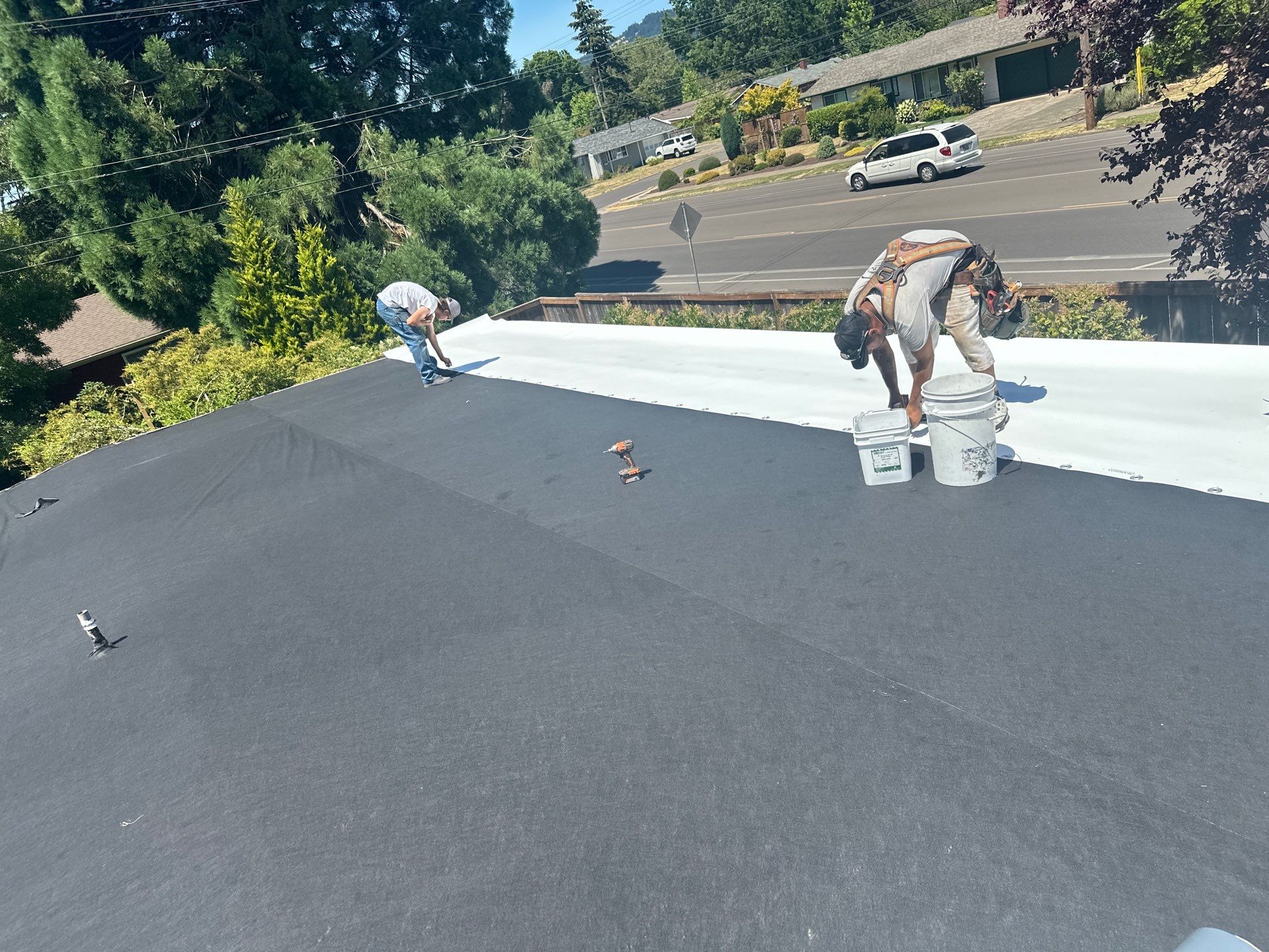 Residential Flat Roof Installation using GAF 60Mil TPO  by Orezona Building & Roofing Company, Inc.
