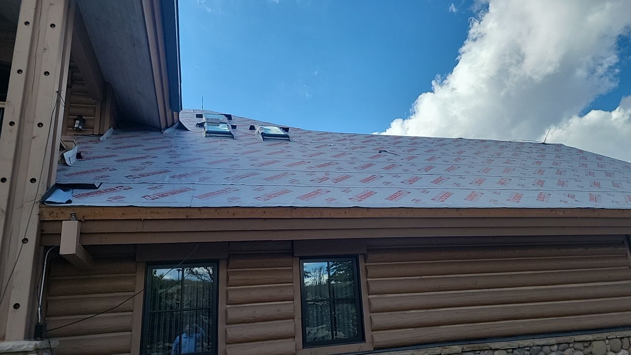 Standing Seam Metal Roof Replacement After Snow Damage by ASAP Roofing & Restoration