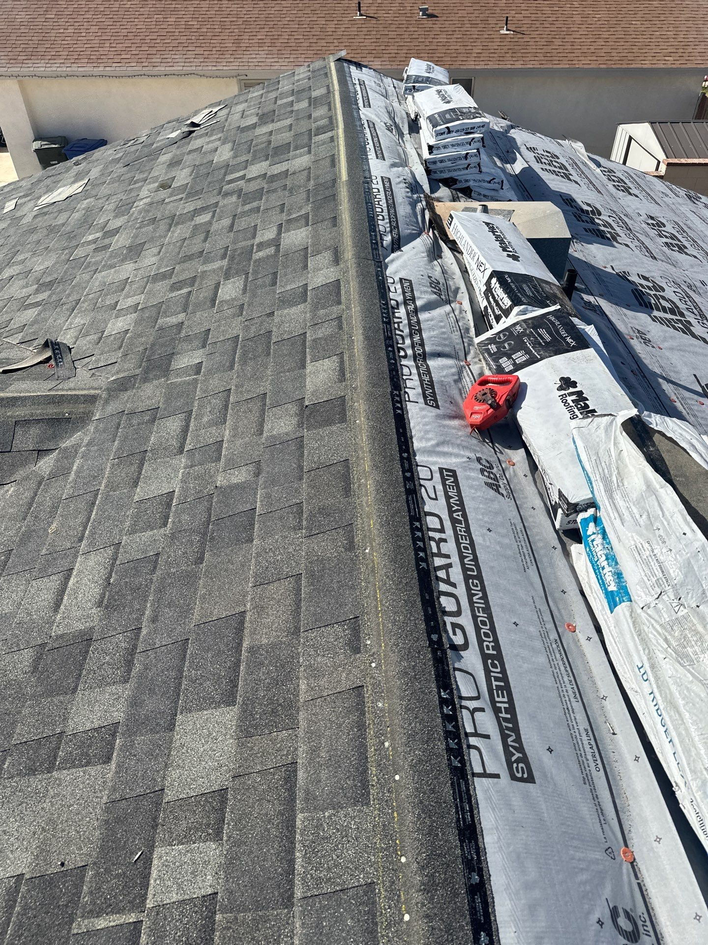 Charcoal Shingles by Reimagine Roofing
