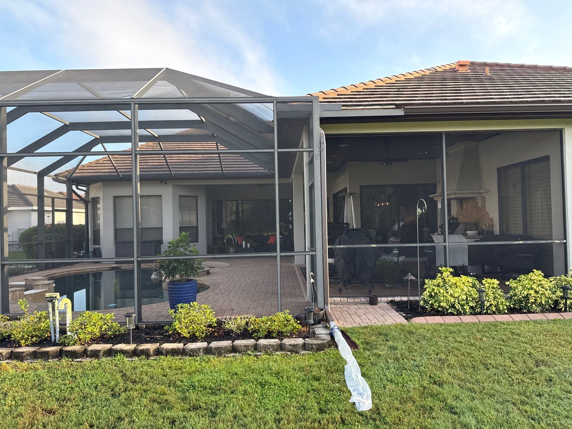 Tile Roof, Paver Pool Deck & Flowerbed Curbing Cleaning | Winding River Bradenton, FL Transformation by Sunshine AquaWash