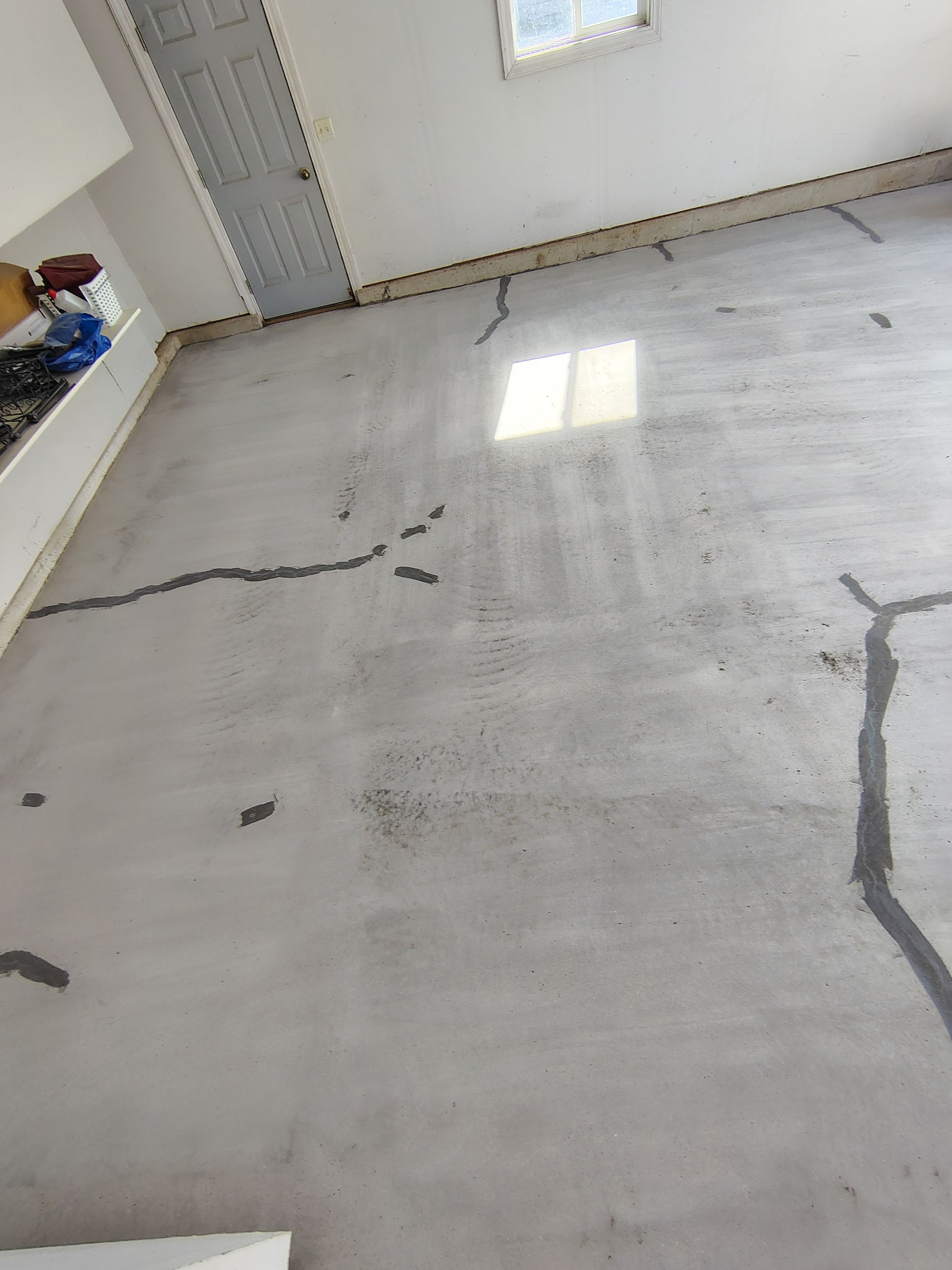 Decorative Chip Epoxy Garage Floor Coating in Sioux Falls by Select Painting, Coatings & Garage Cabinets