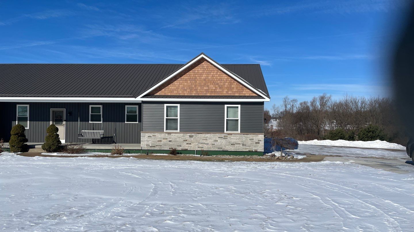 Siding Installation using Certainteed Board & Batten by Acme Exteriors