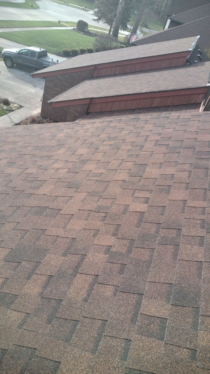 Residential Roof Replacement by Absolute Roofing and Construction