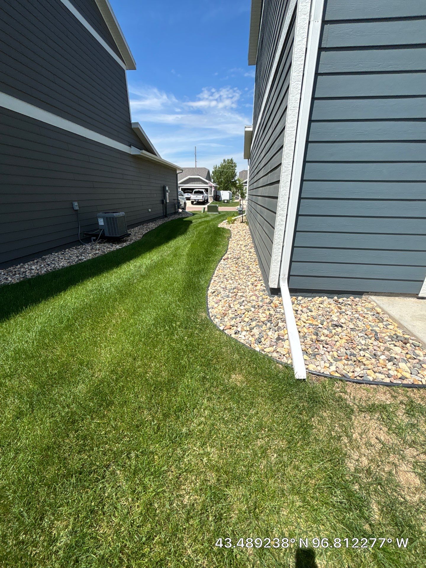 Custom Epoxy Garage Floor and Patio Coating in Sioux Falls by Select Painting, Coatings & Garage Cabinets