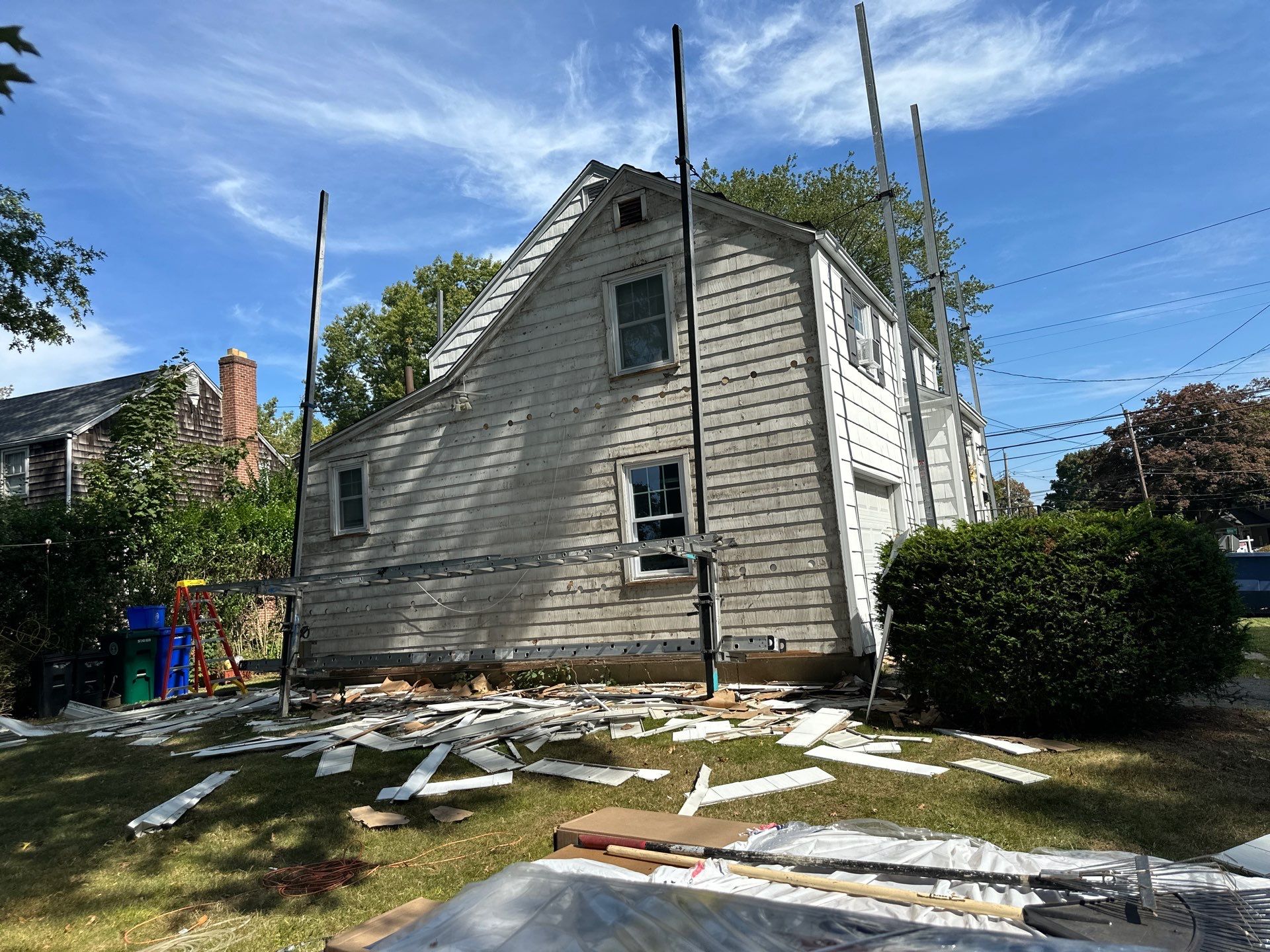 Siding Installation using CertainTeed Monogram Vinyl Siding - D4 - Forest by A Plus Exterior