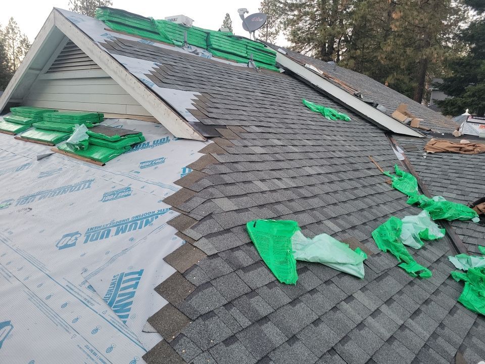 Attic Insulation, Roofing, and Solar for this in-town home by Byers Enterprises 
