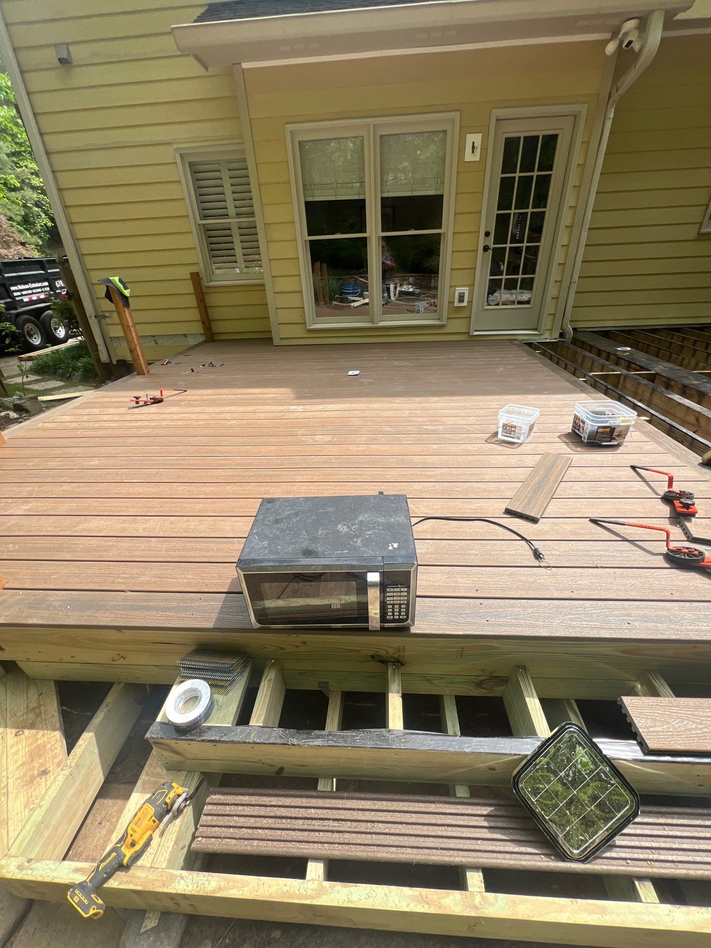 James Hardie Siding Install, Rotten Wood Replacement, Trex Deck Resurface, and Exterior Paint Project in Roswell, GA by Nelson Exteriors 