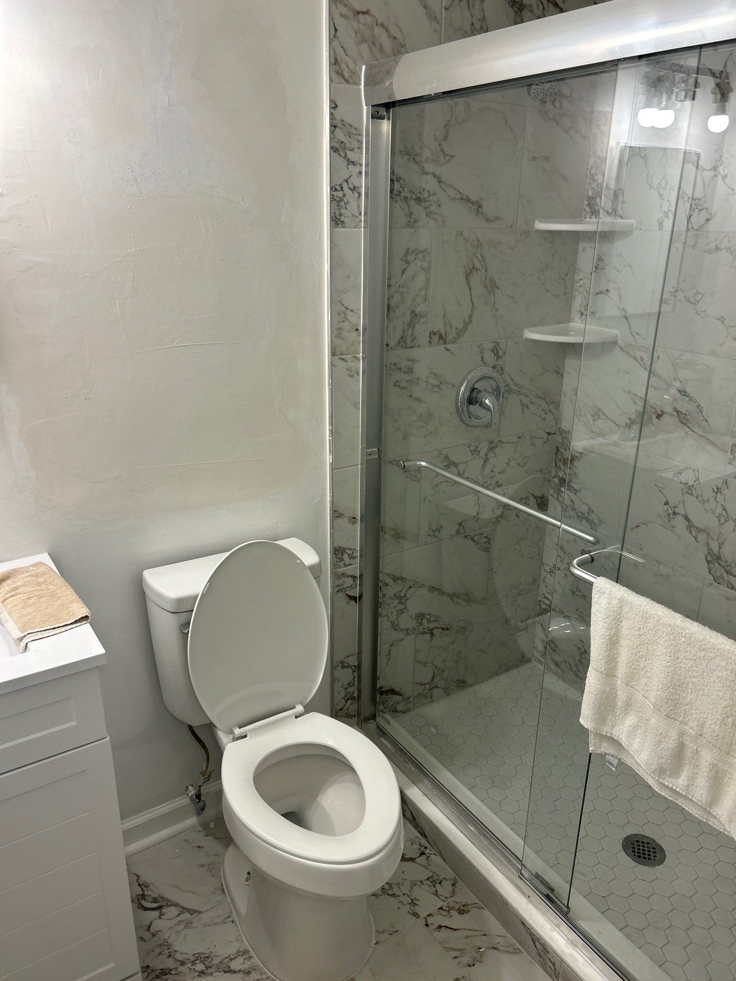 Dual Bathroom Makeover by urban green energy llc