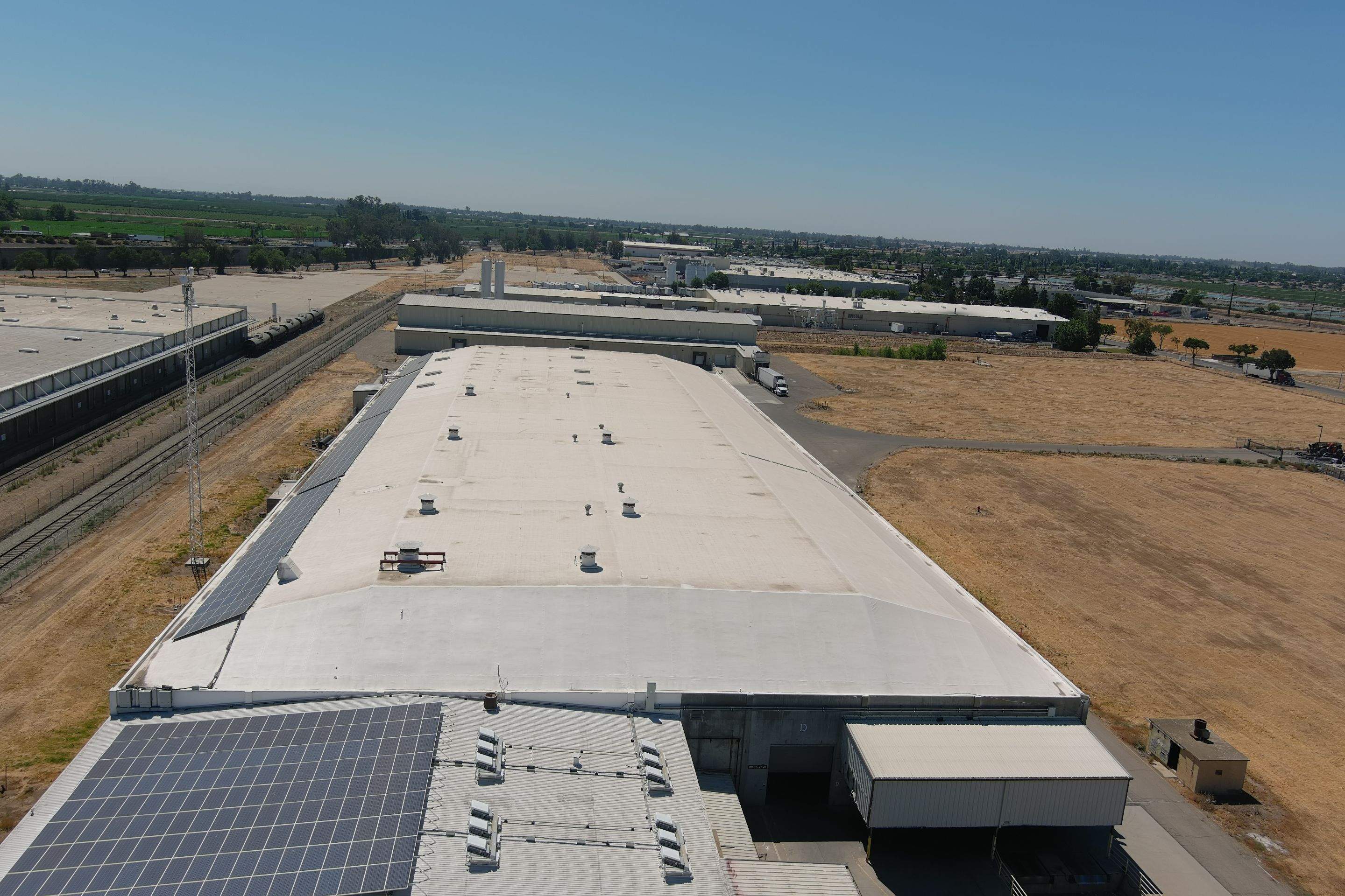 Single-ply restoration system using Conklin Benchmark/PUMA XL fabric and coating by Straight Edge Roofing Inc