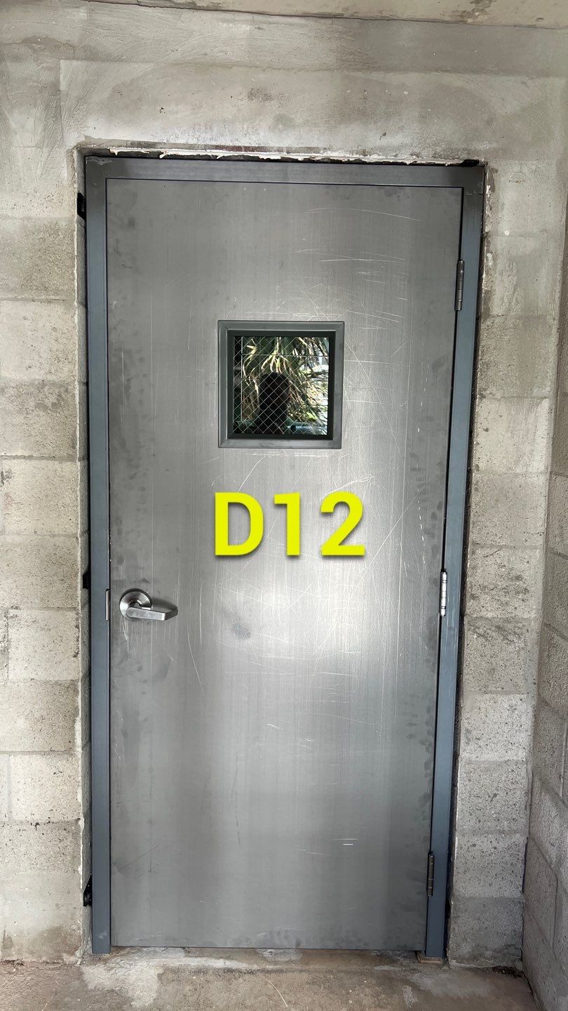 Commercial Stairwell Door Replacement & Hollow Metal Door Retrofit – Pompano Beach High-Rise by The Door Doctor of South Florida, Inc.