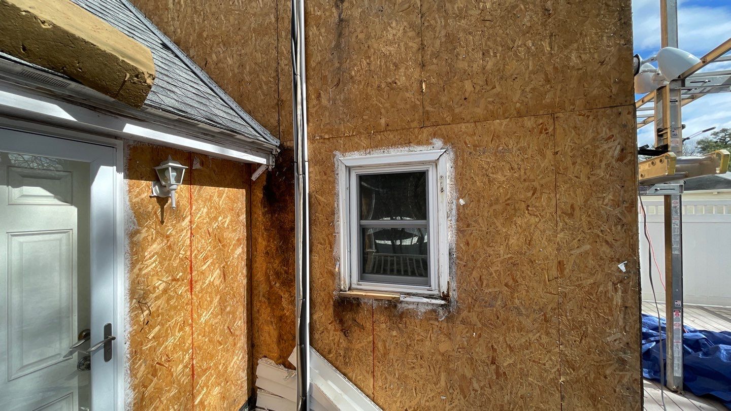 Complete Exterior Renovation with New Siding & Gutters   by Sensible Home Solutions