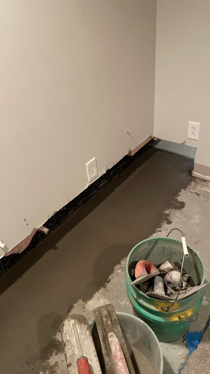 Interior Drain Tile in a Finished South Minneapolis Basement by Waterproofing Northeast