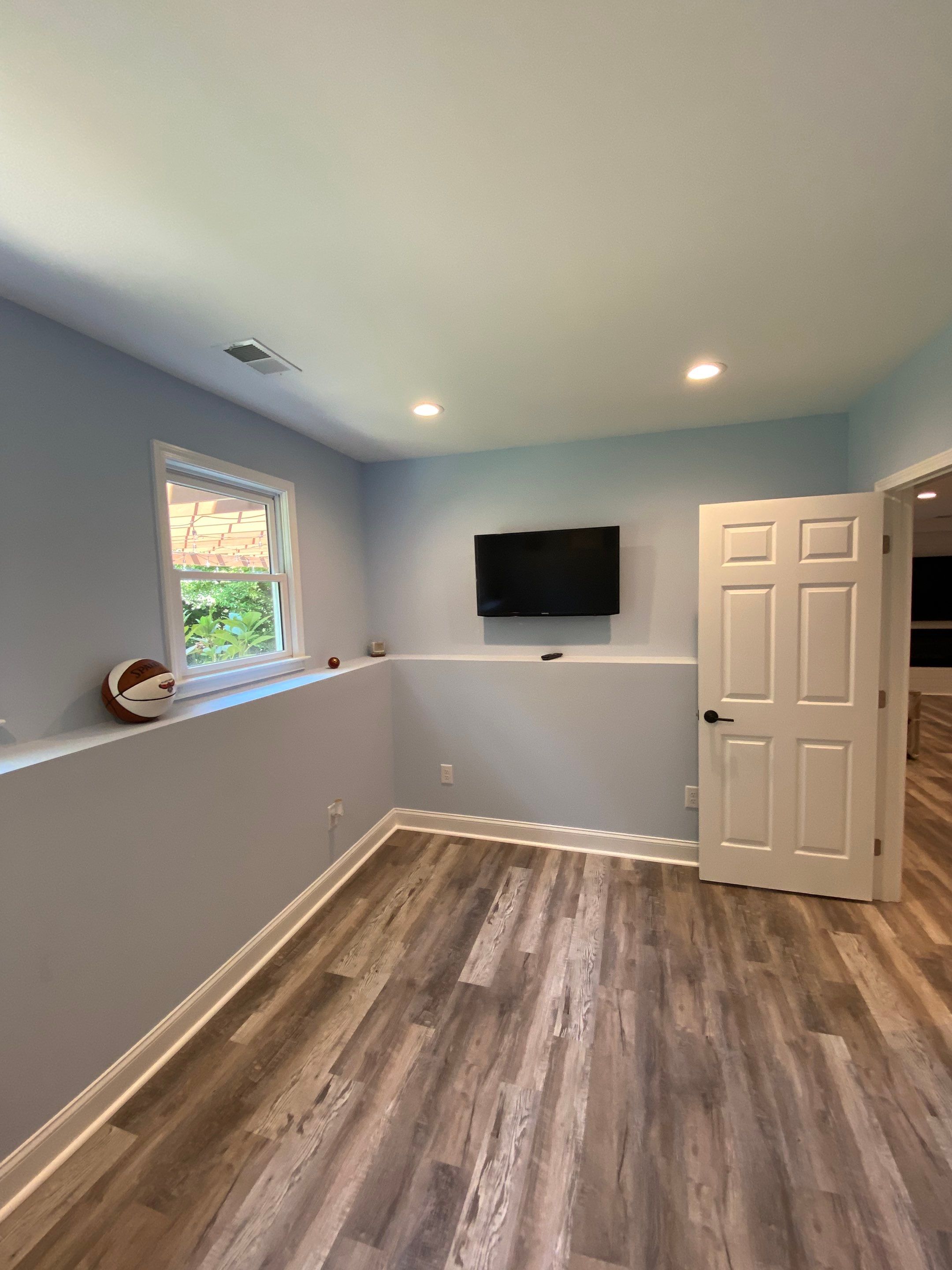 Marietta Basement Remodeling Featuring Custom Wet Bar and Marble Shower by Swift Home Renovations