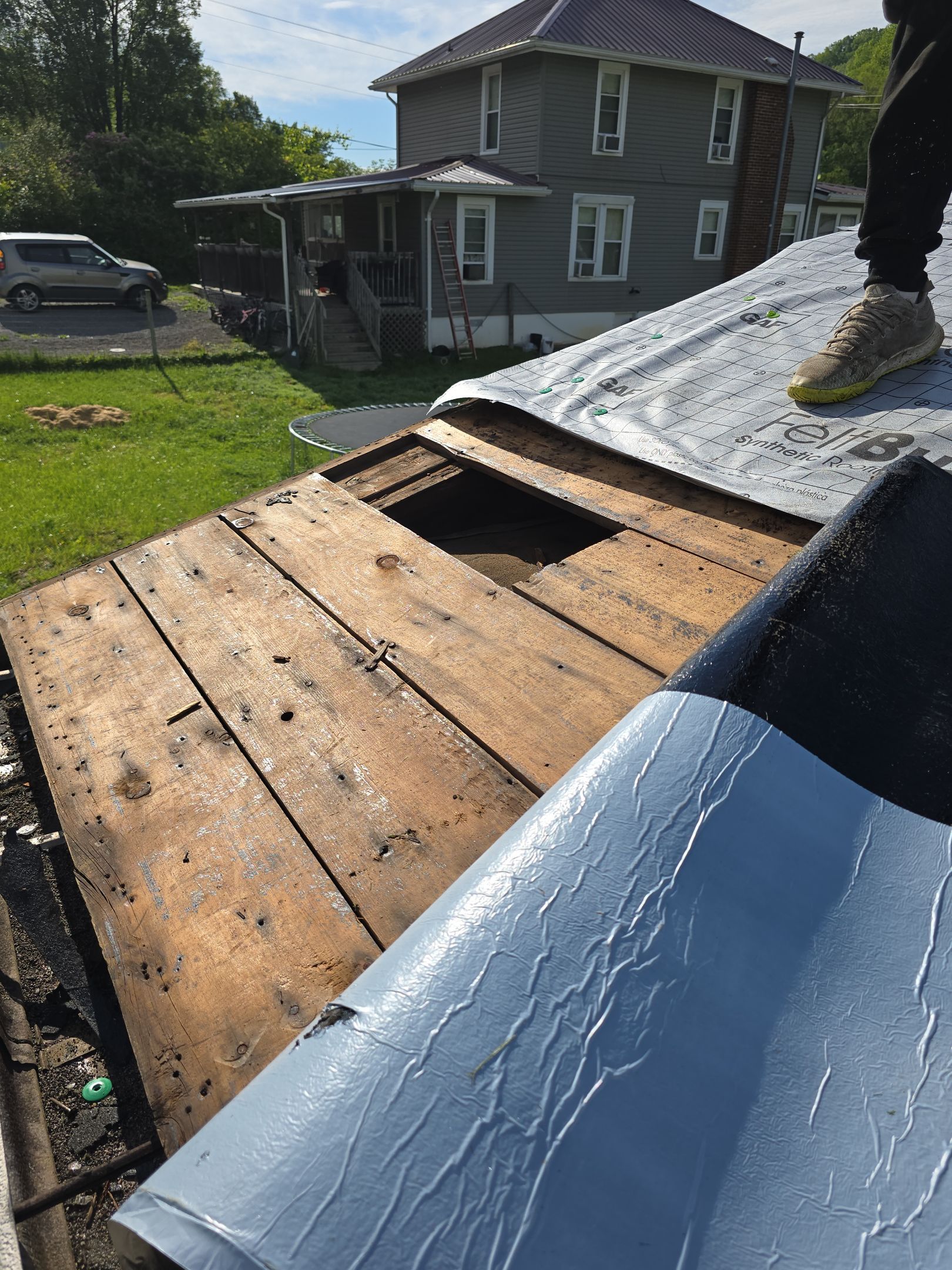 Residential Roofing Installation using GAF Timberline HDZ Pewter Gray by Rainstoppers Roofing