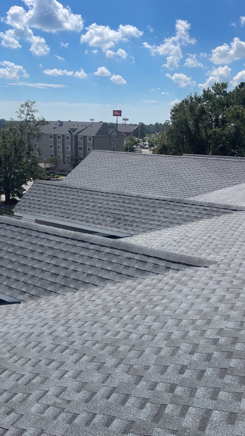 Commercial Roofing Installation using Roof Replacement by American Roofing & Construction LLC