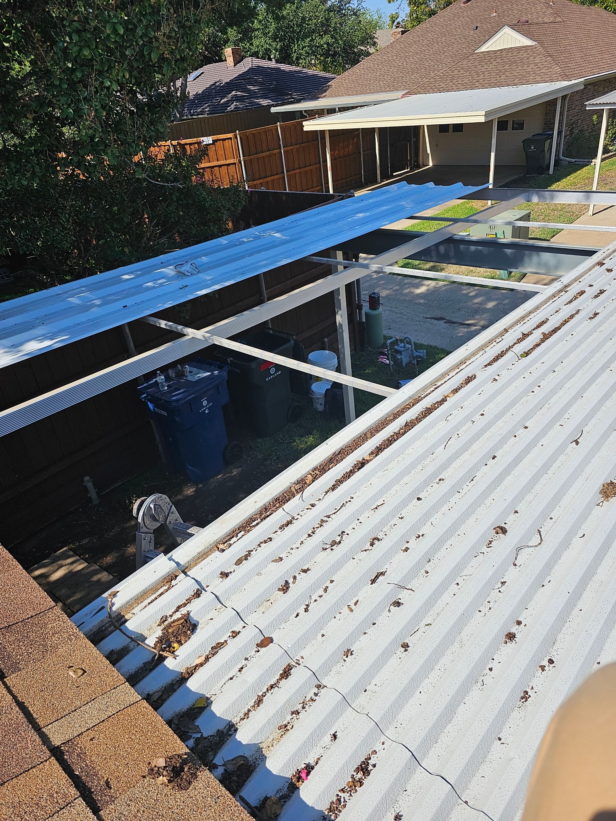 Carport & fence stain by EL-GC LLC 