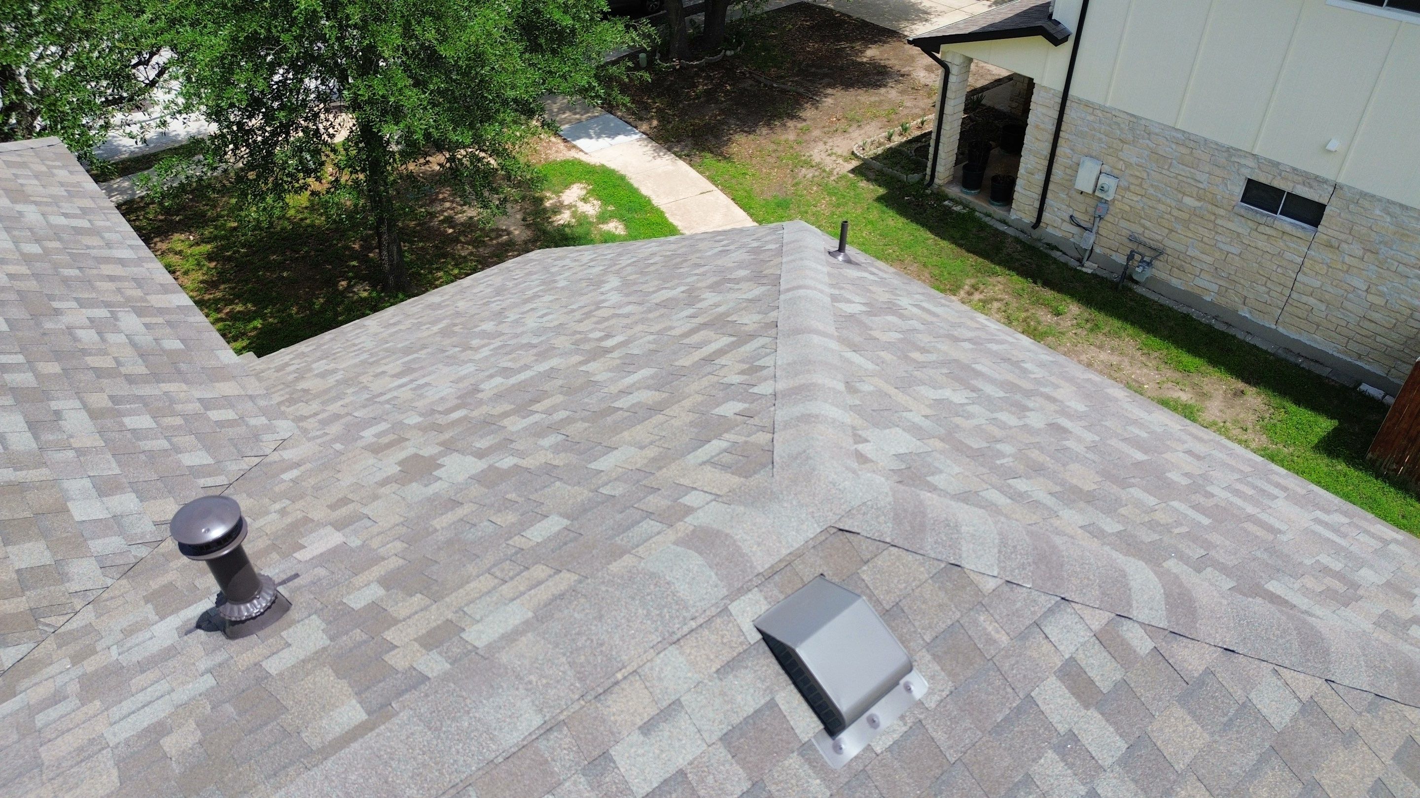 Roof Replacement & Chimney Cricket Upgrade in Cedar Park, TX by Kstylez Roofing & Construction