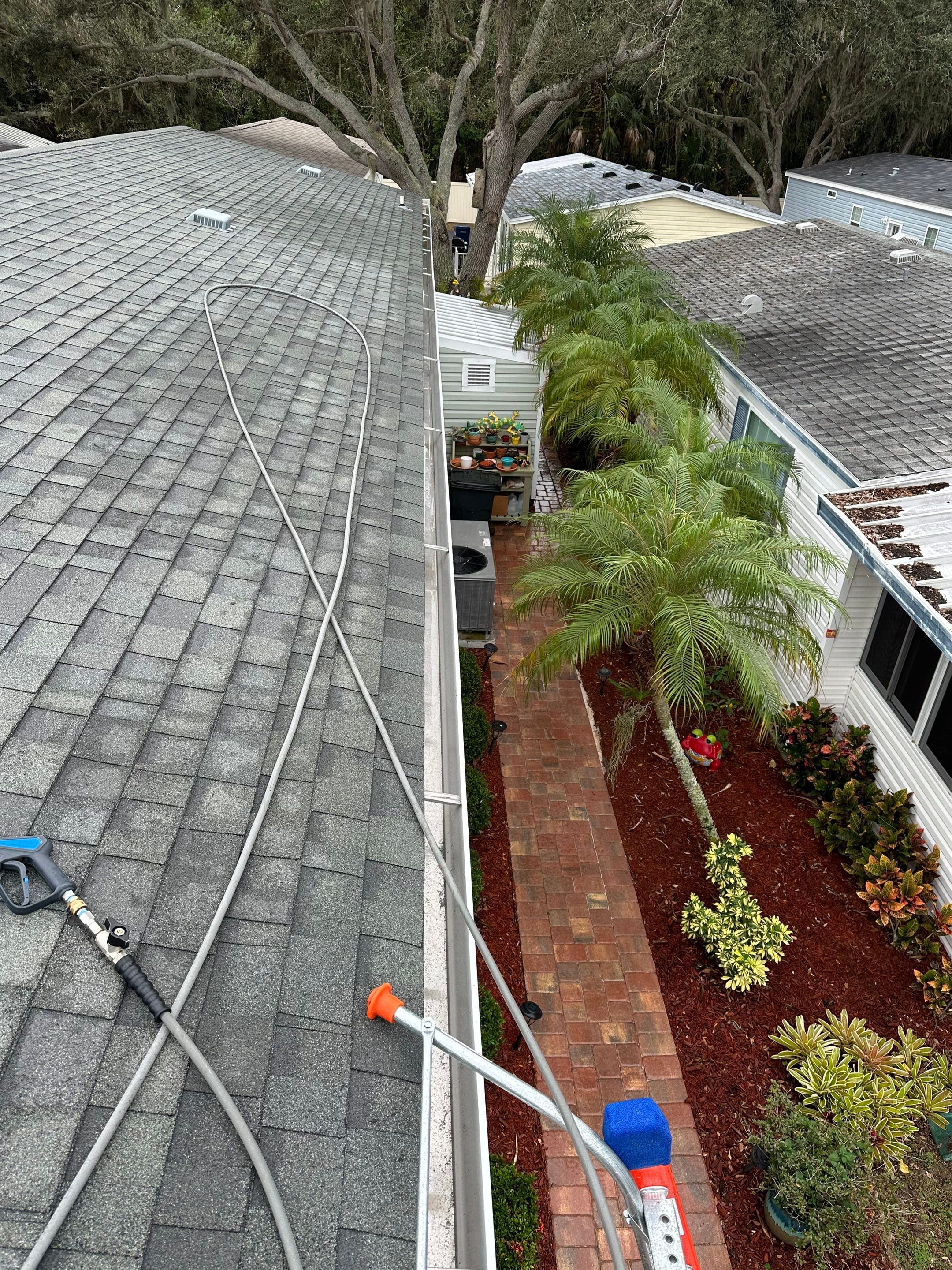 Gutter Cleaning and House Washing Services  by Sunshine AquaWash